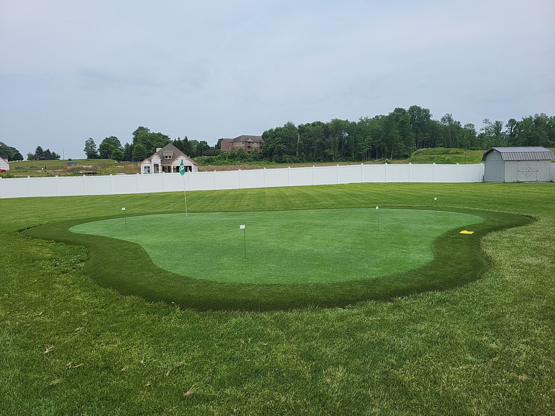 Custom Residential Synthetic Putting Green Installation in Xenia, Ohio by Southwest Greens Midwest