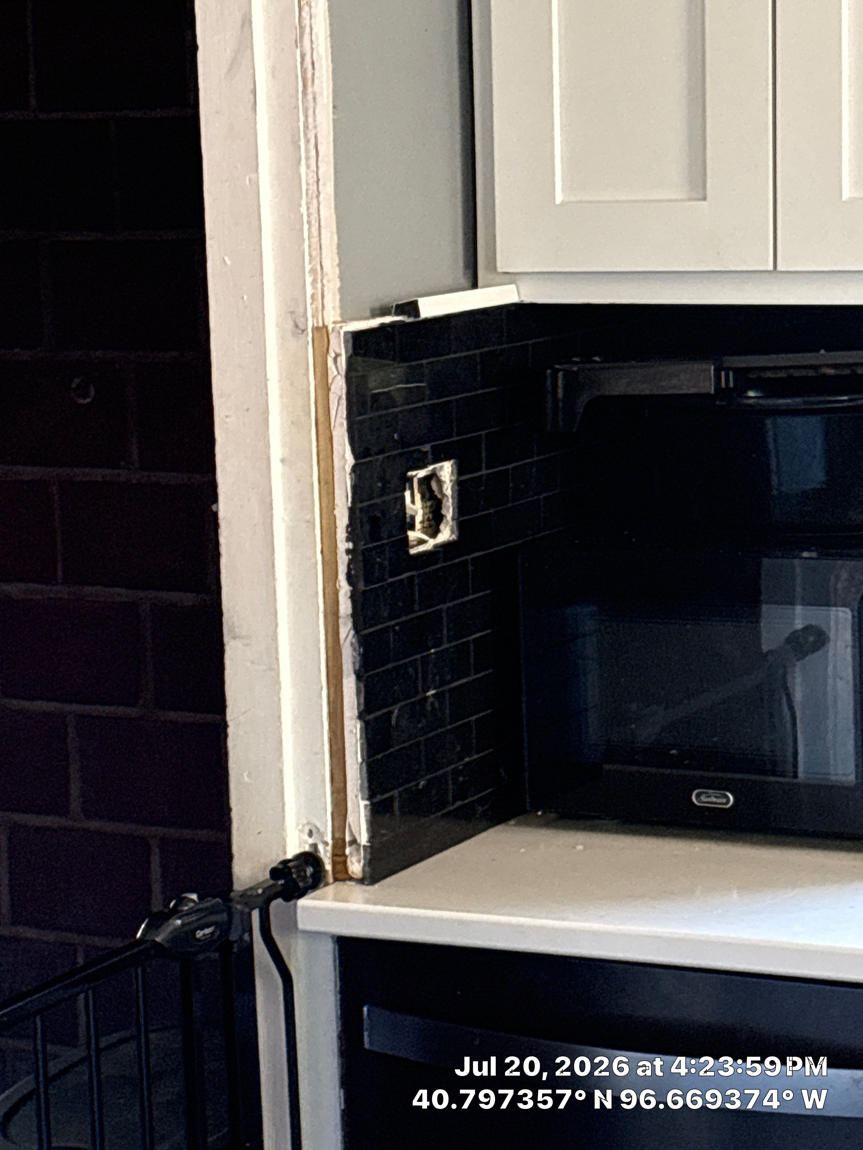 Kitchen Remodel in Lincoln Nebraska Featuring Two-Tone Cabinetry and Black Backsplash by CompanyCam Sales Demo