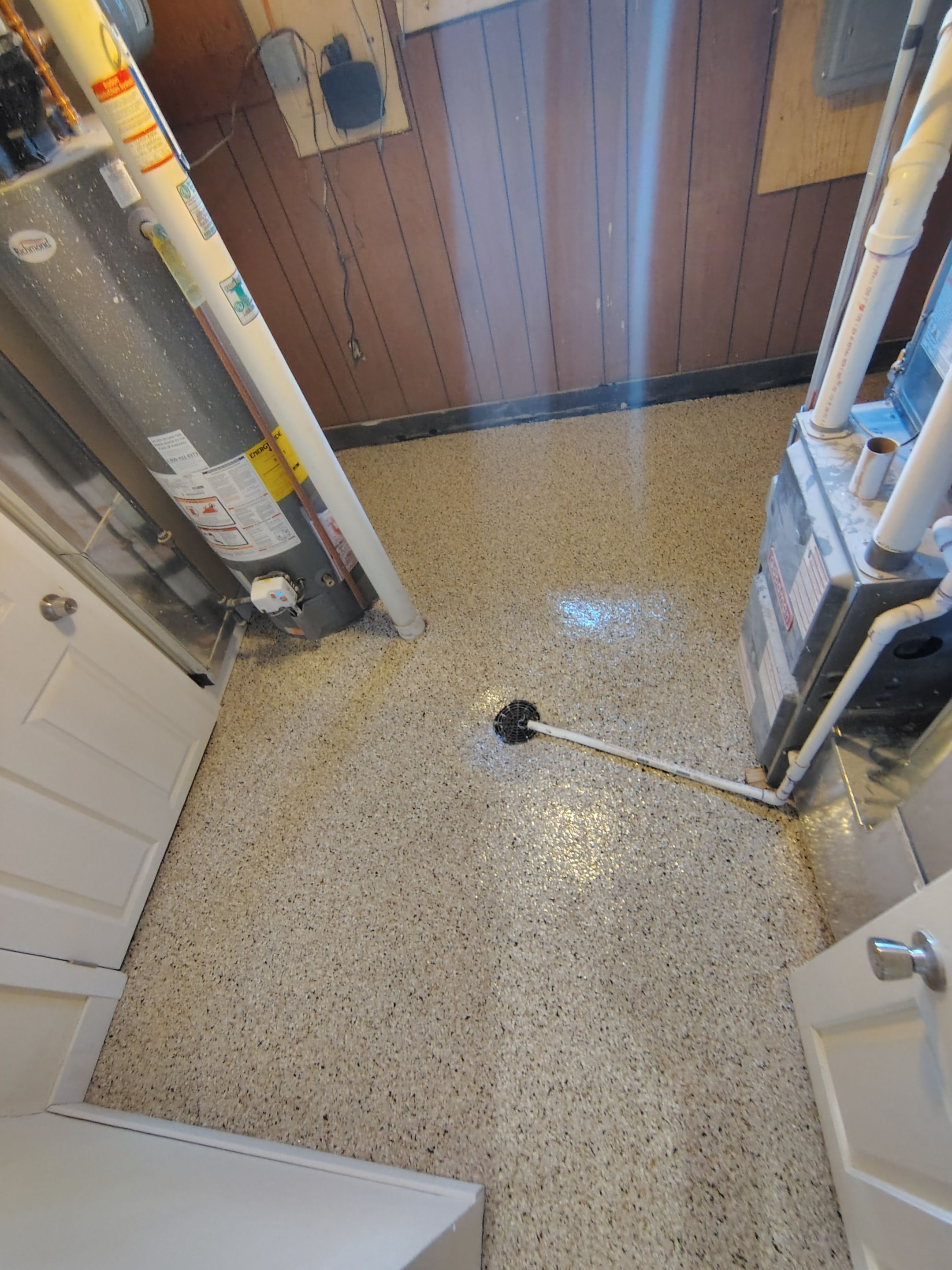 Comprehensive Basement Concrete Floor Coating and Crack Repair in Sioux Falls by Select Painting, Coatings & Garage Cabinets