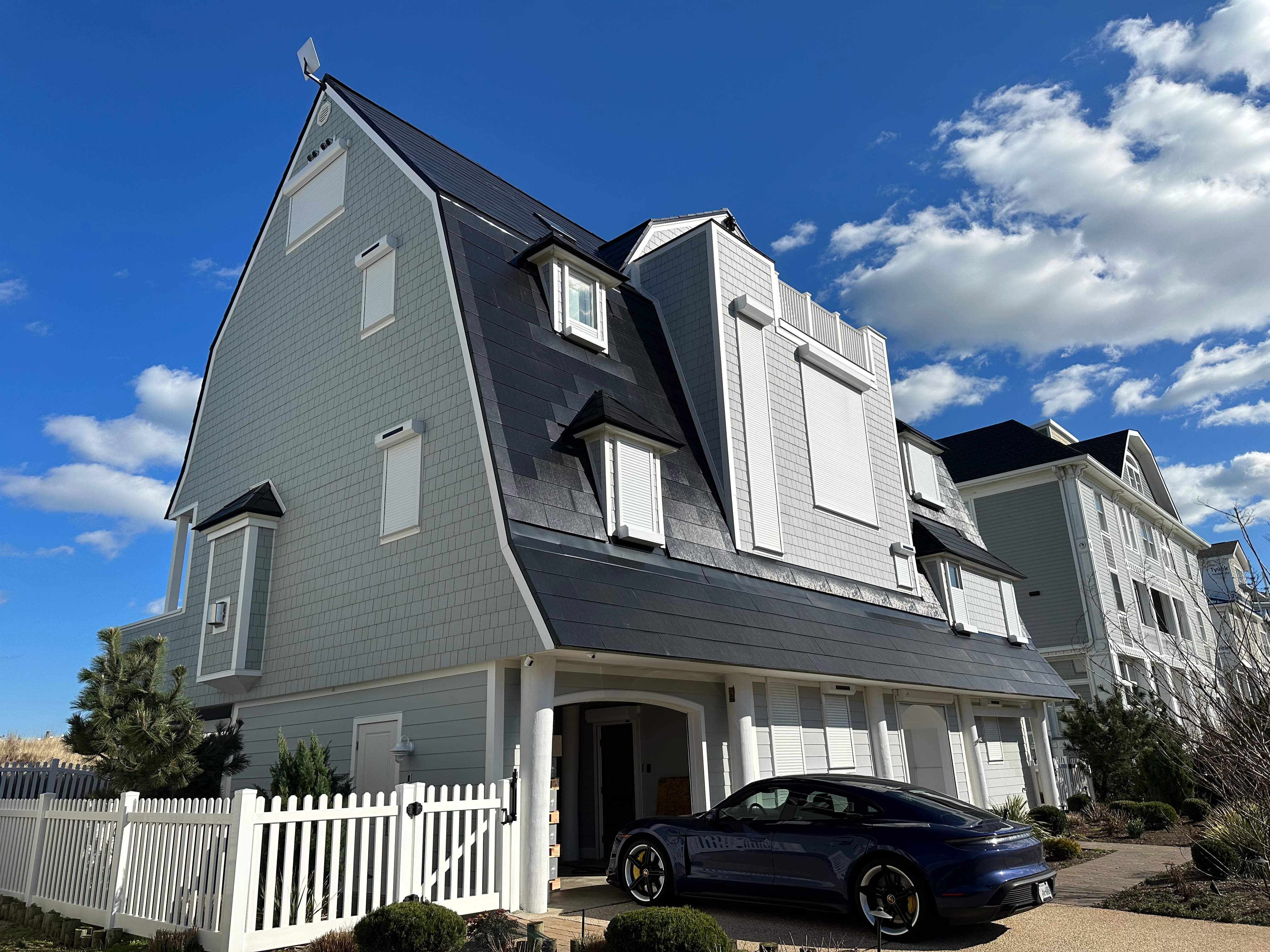 World's Steepest Tesla Solar Roof! by American Home Contractors