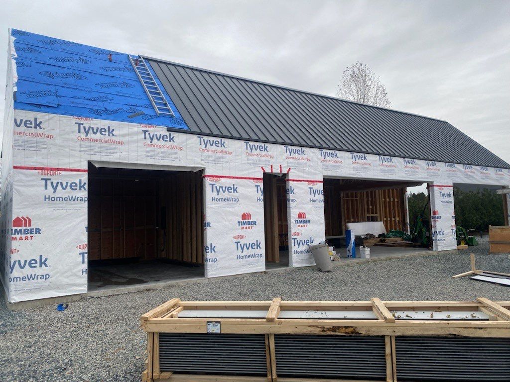 Residential Roofing and siding Installation using 12" Prolok metal  by Top Notch Roofing Inc