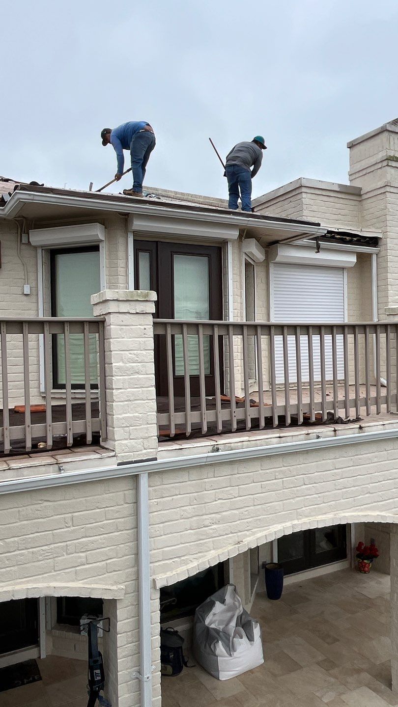 Off with the Tile and on with the TILCOR stone coated metal.  by Bayfront Roofing and Construction