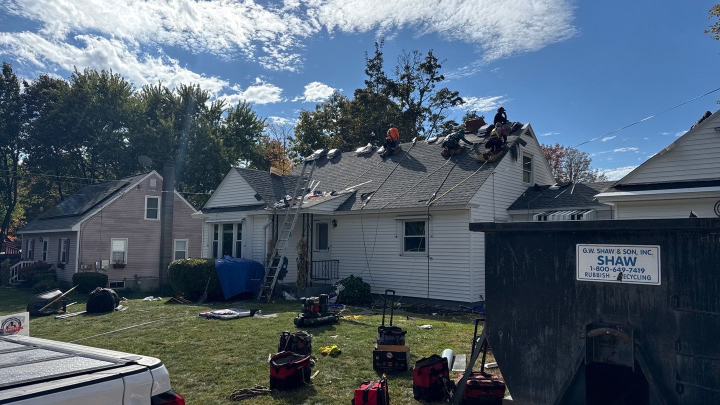 Complete Roof Replacement with GAF Pewter Gray HDZ™ Shingles, VELUX Skylights & New Gutters by Sensible Home Solutions