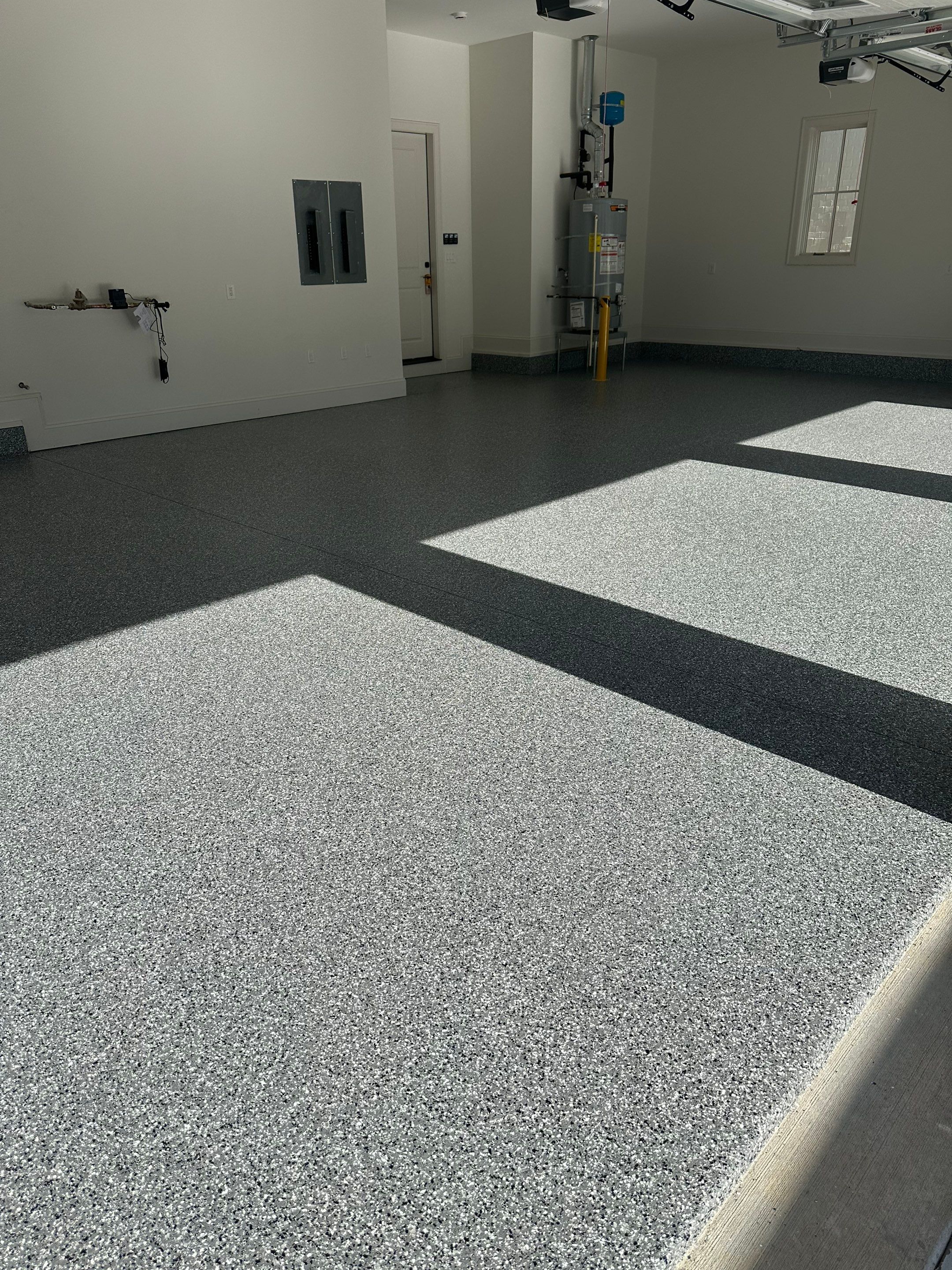 Garage Floor Coating using Wombat by My Garage Floor Guys