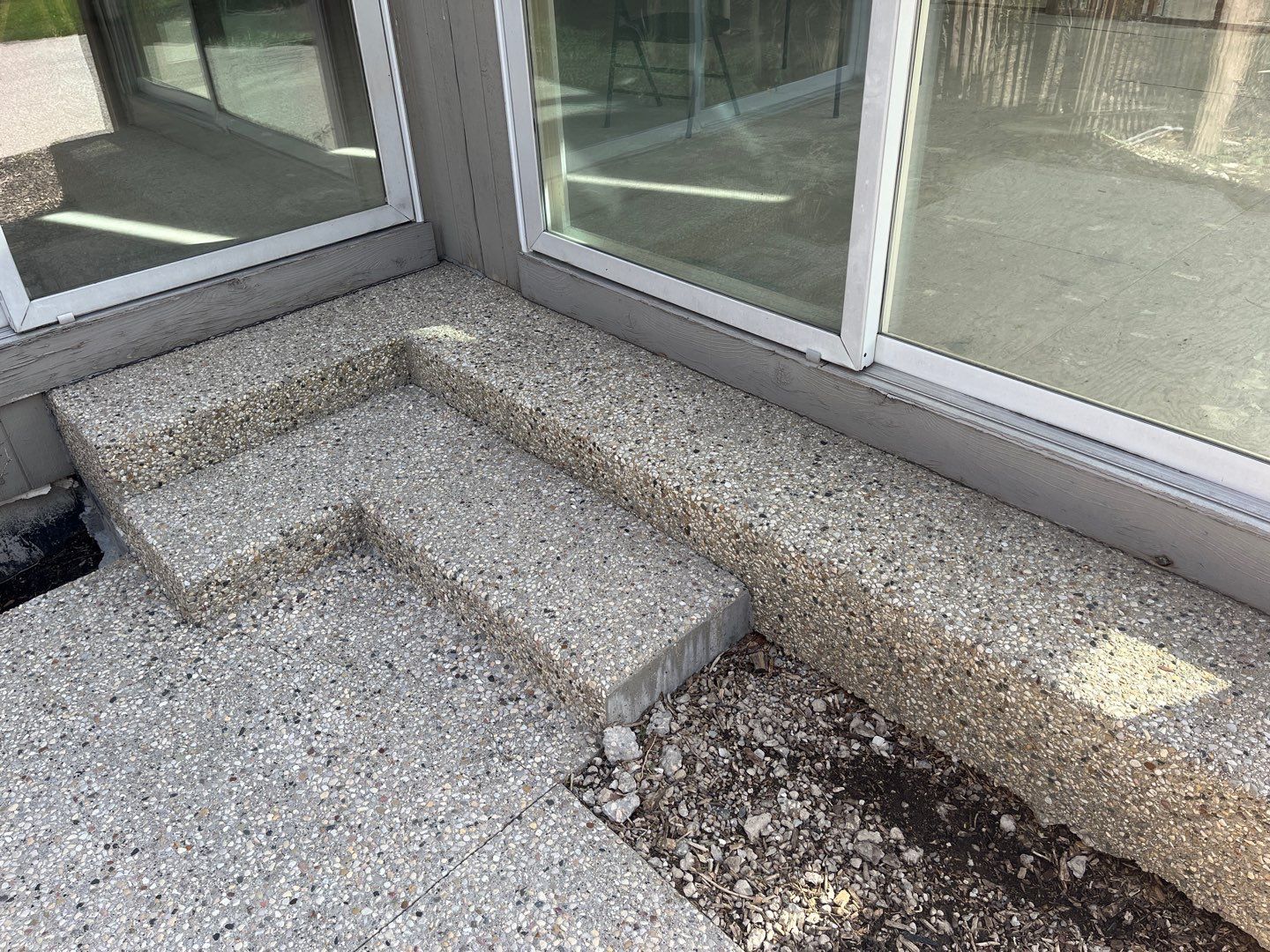 Aggregate Clean and seal using low gloss sealer by Northern Power Washing LLC.