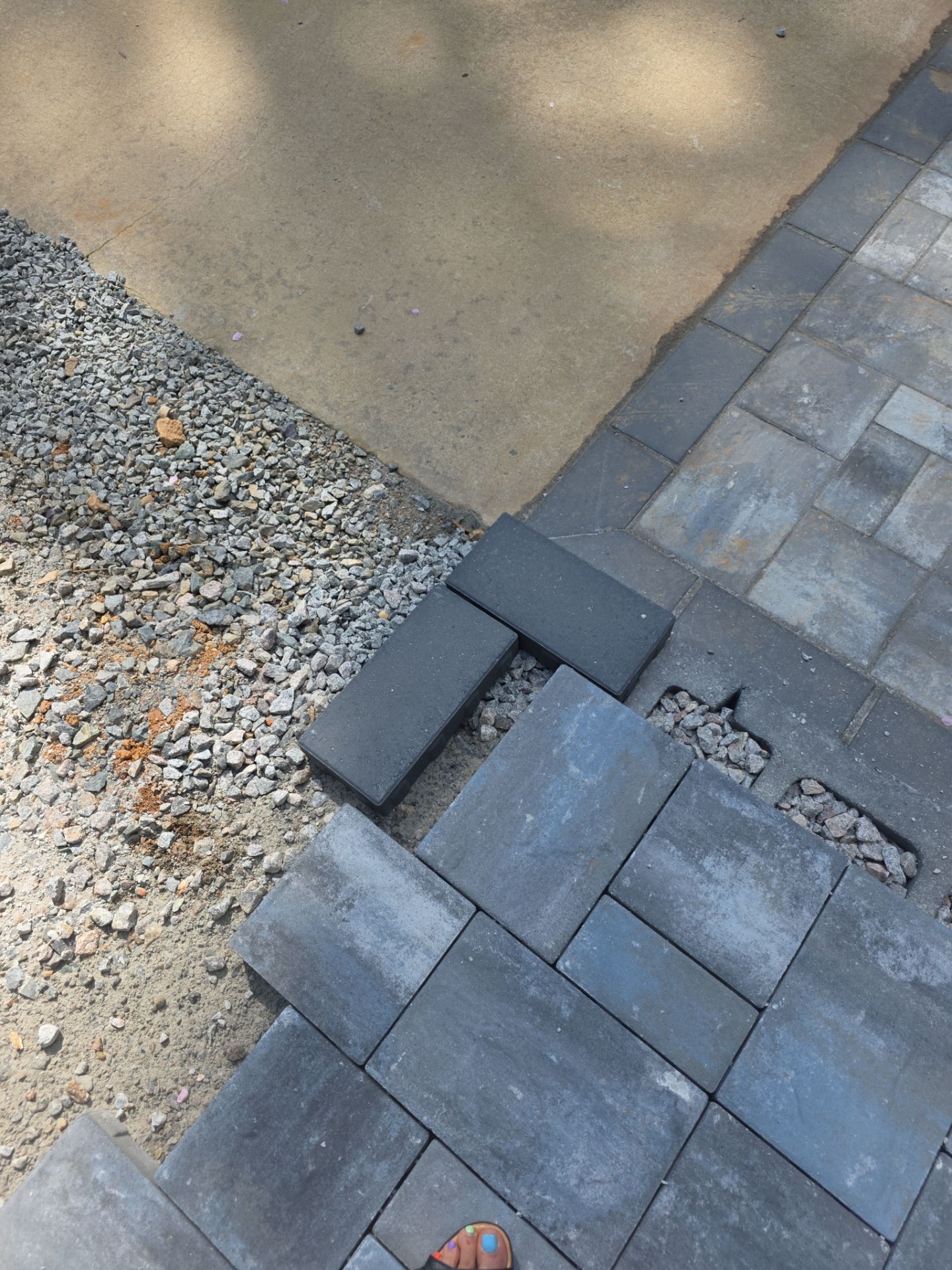 Pittsboro Outdoor Living Transformation – Retaining Wall, Paver Patio & Elevated Deck by Elite Remodeling and Design LLC