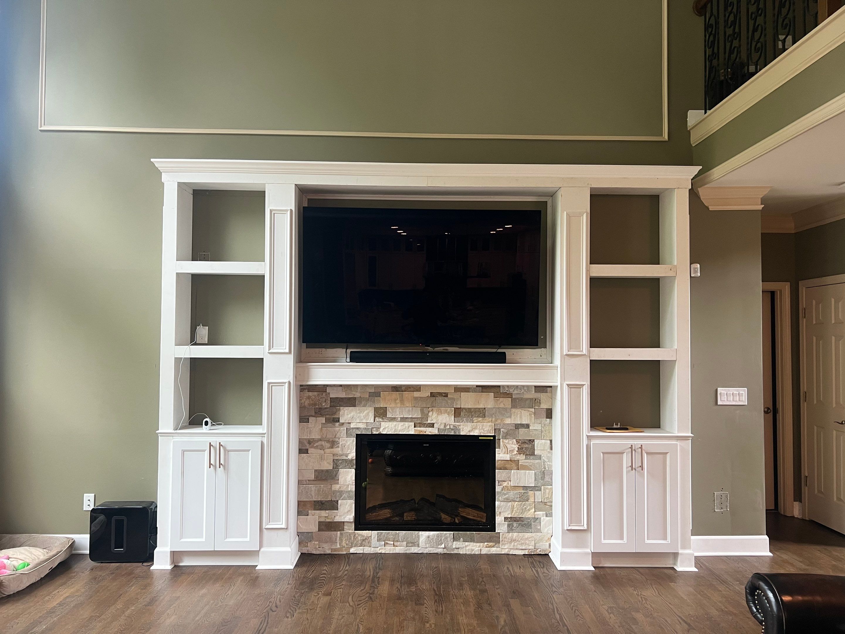 Custom Stone Fireplace and White Built-in Cabinetry in Suwanee by Swift Home Renovations