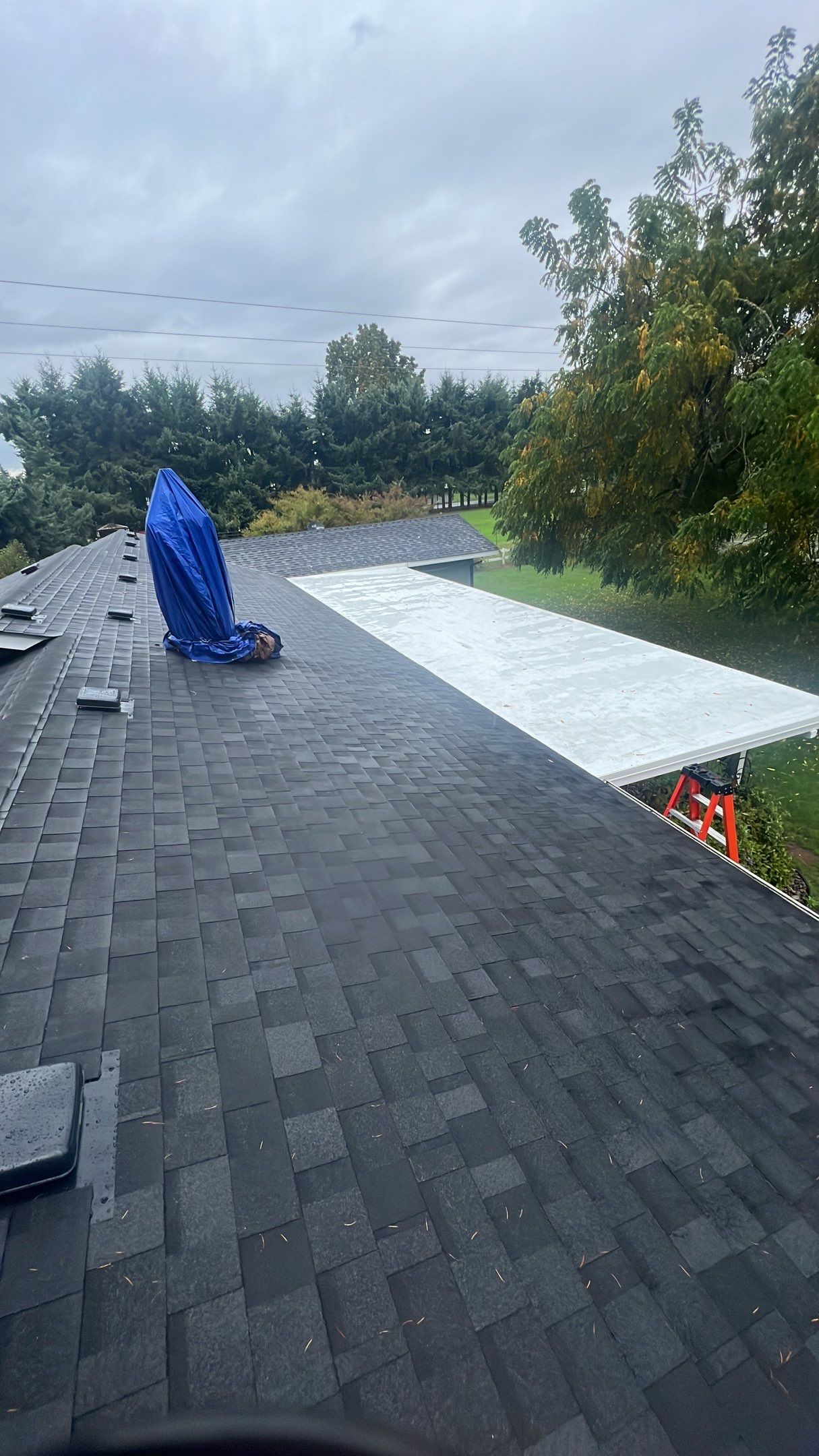 Residential Roofing Installation using IKO Dynasty (Color: Granite Black) by Orezona Building & Roofing Company, Inc.