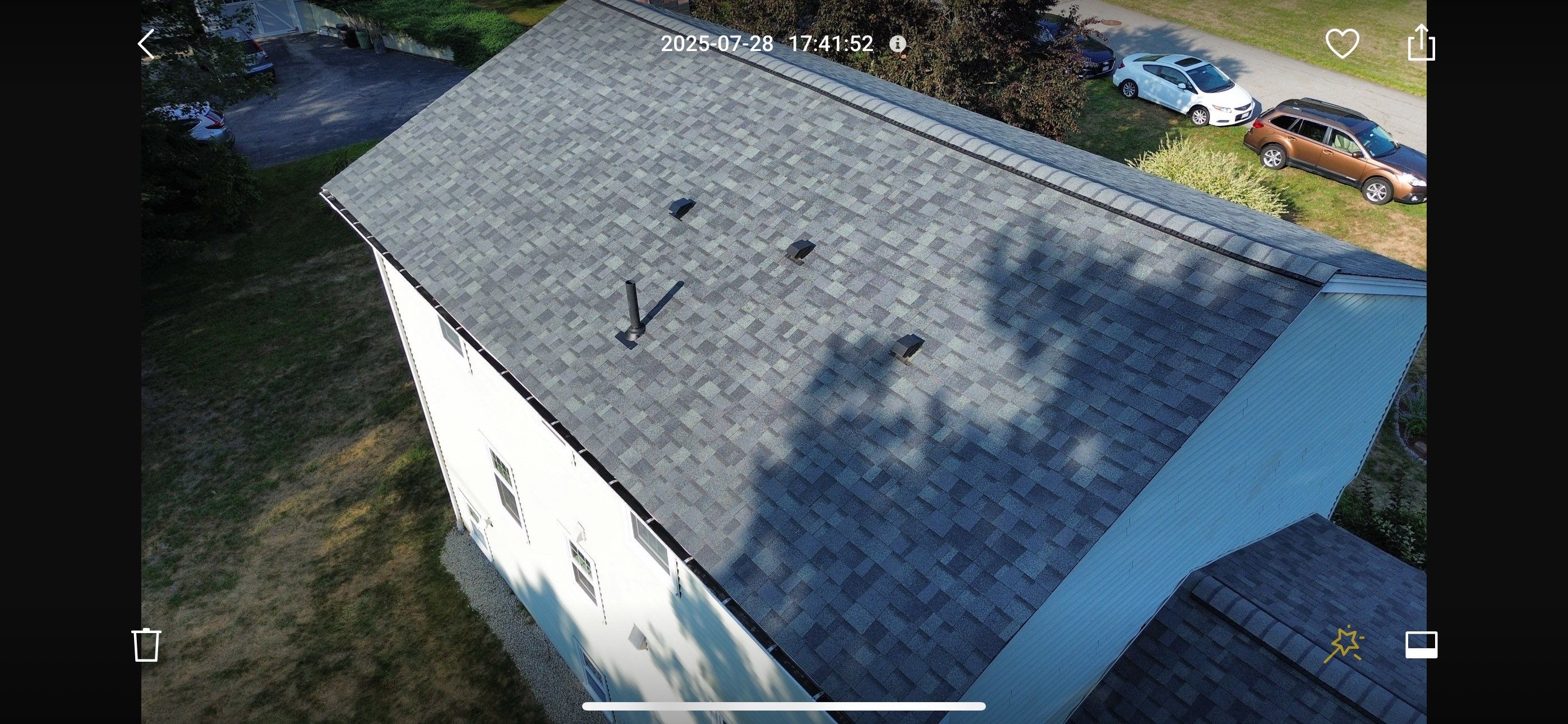 Complete Roof Replacement with Chimney Flashing, Gutter Guard System, and Vinyl Siding Repairs by Mighty Dog Roofing of Greater Middlesex County