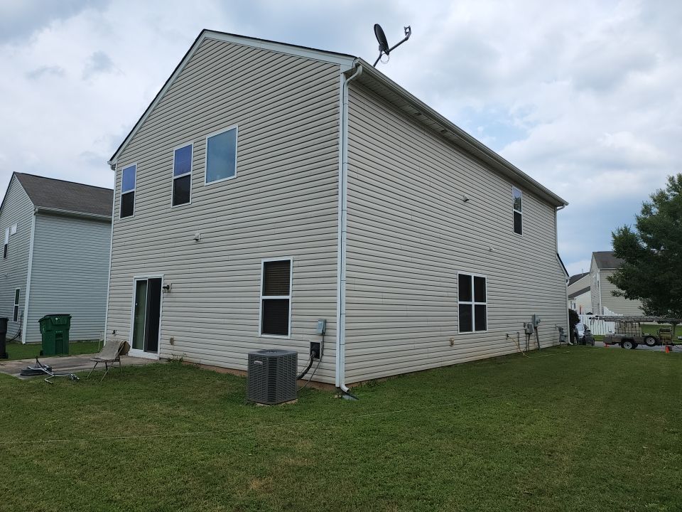 House Wash using cleaner by Power Wash Masters LLC