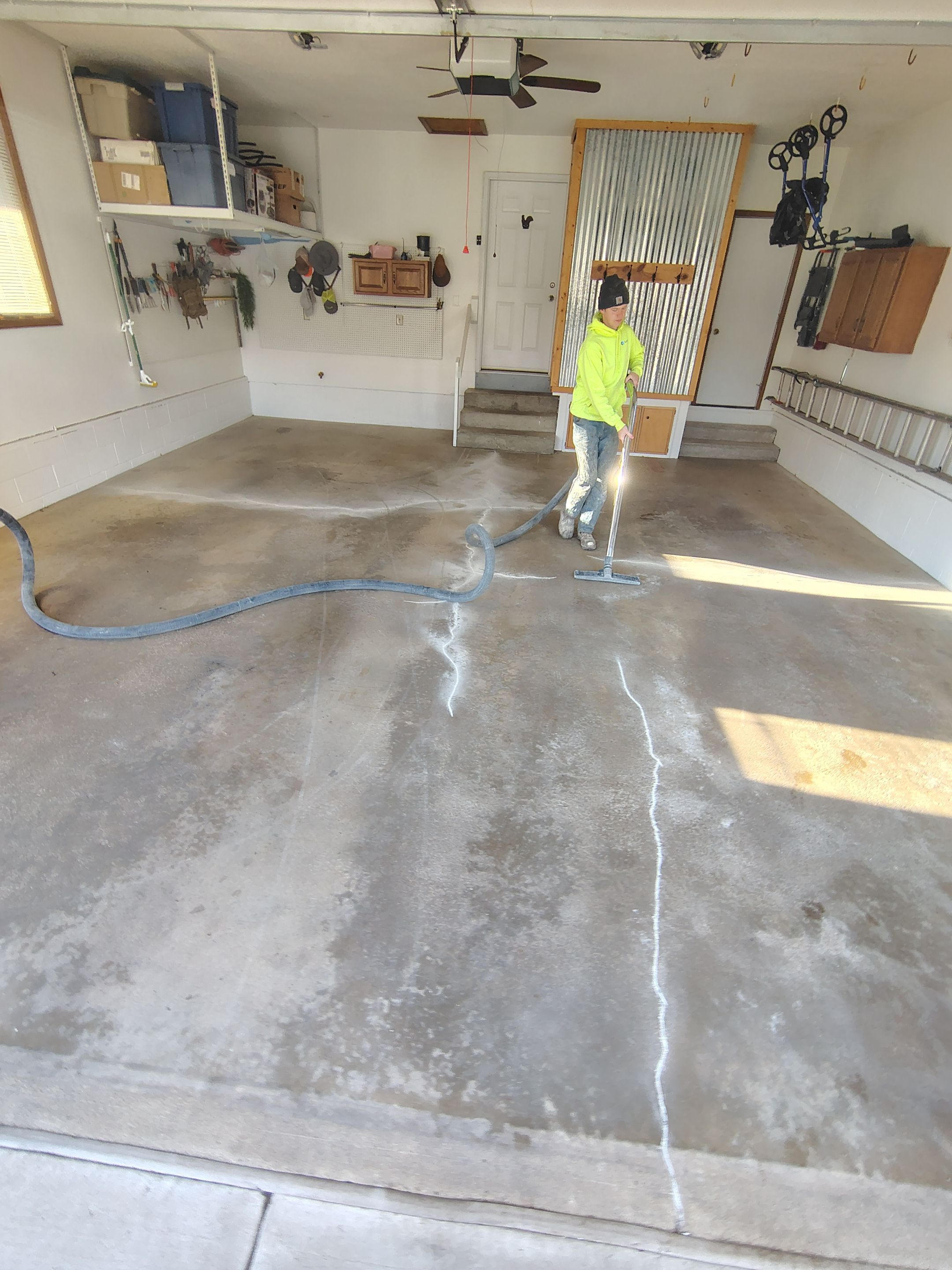Multi-Colored Flake Epoxy Garage Floor Coating and Crack Repair by Select Painting, Coatings & Garage Cabinets