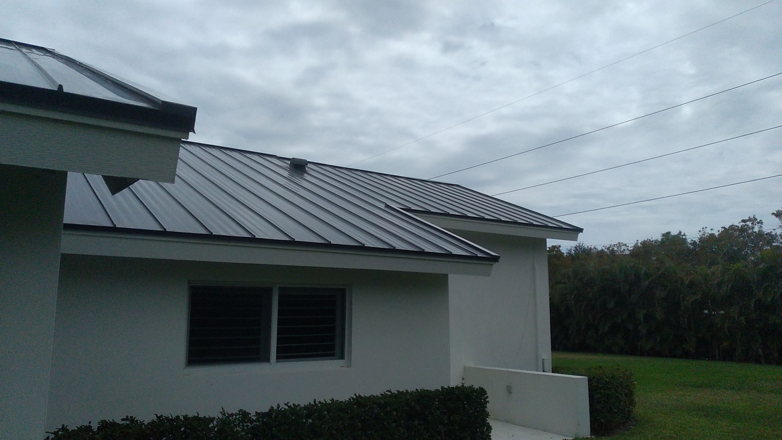 Residential Roofing Installation using 1" Nail strip metal roof by BLUES BROTHERS ROOFING