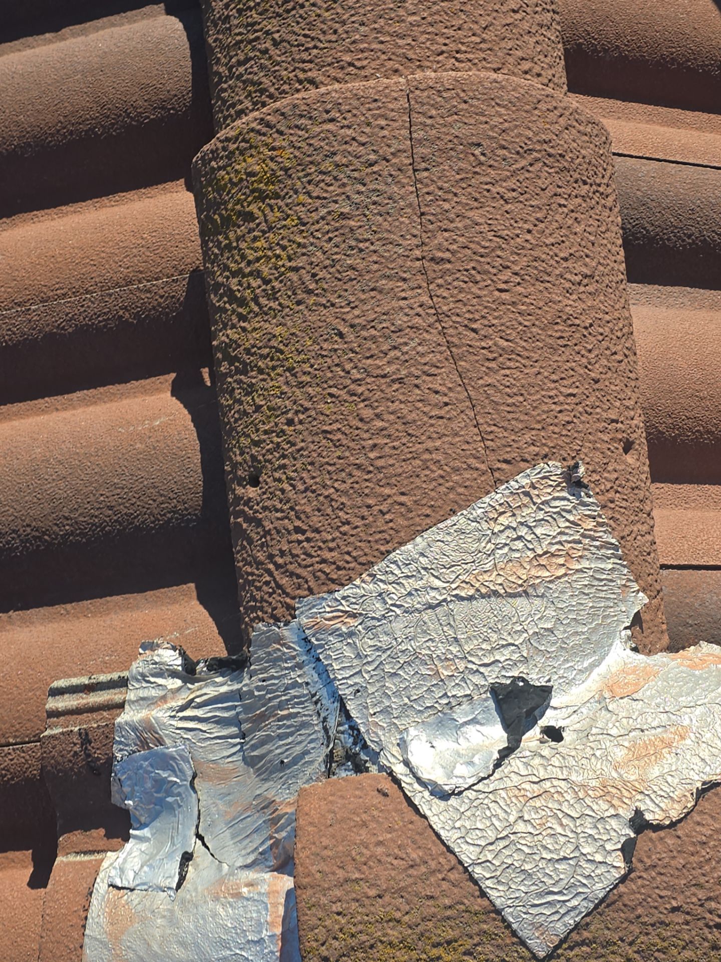 Tile Roof repair by Grandmark Service Company