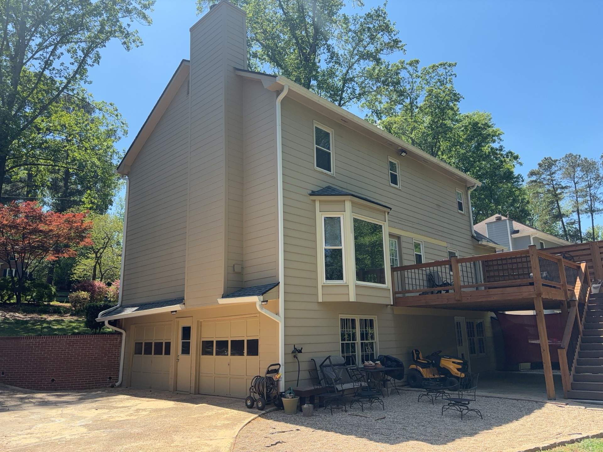 Siding Replacement and Exterior Painting using James Hardie Lap Siding and Sherwin Williams Paint by Nelson Exteriors 