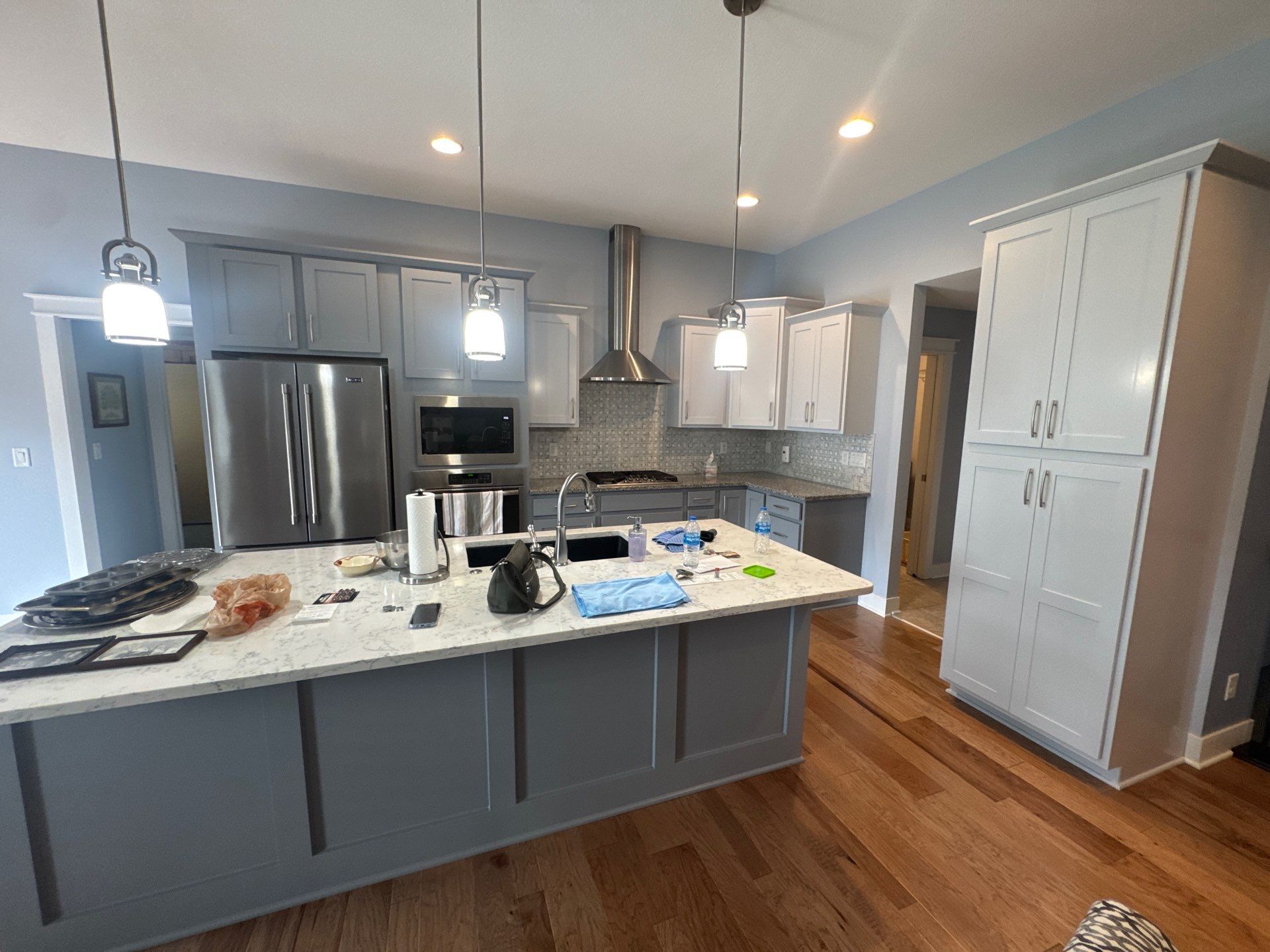 Residential Interior Repaint Color Change on Walls and Cabinets by Midwest Paint LLC