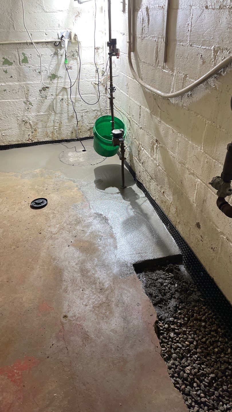 Interior Drain Tile & Sump Pump System in North Minneapolis by Waterproofing Northeast