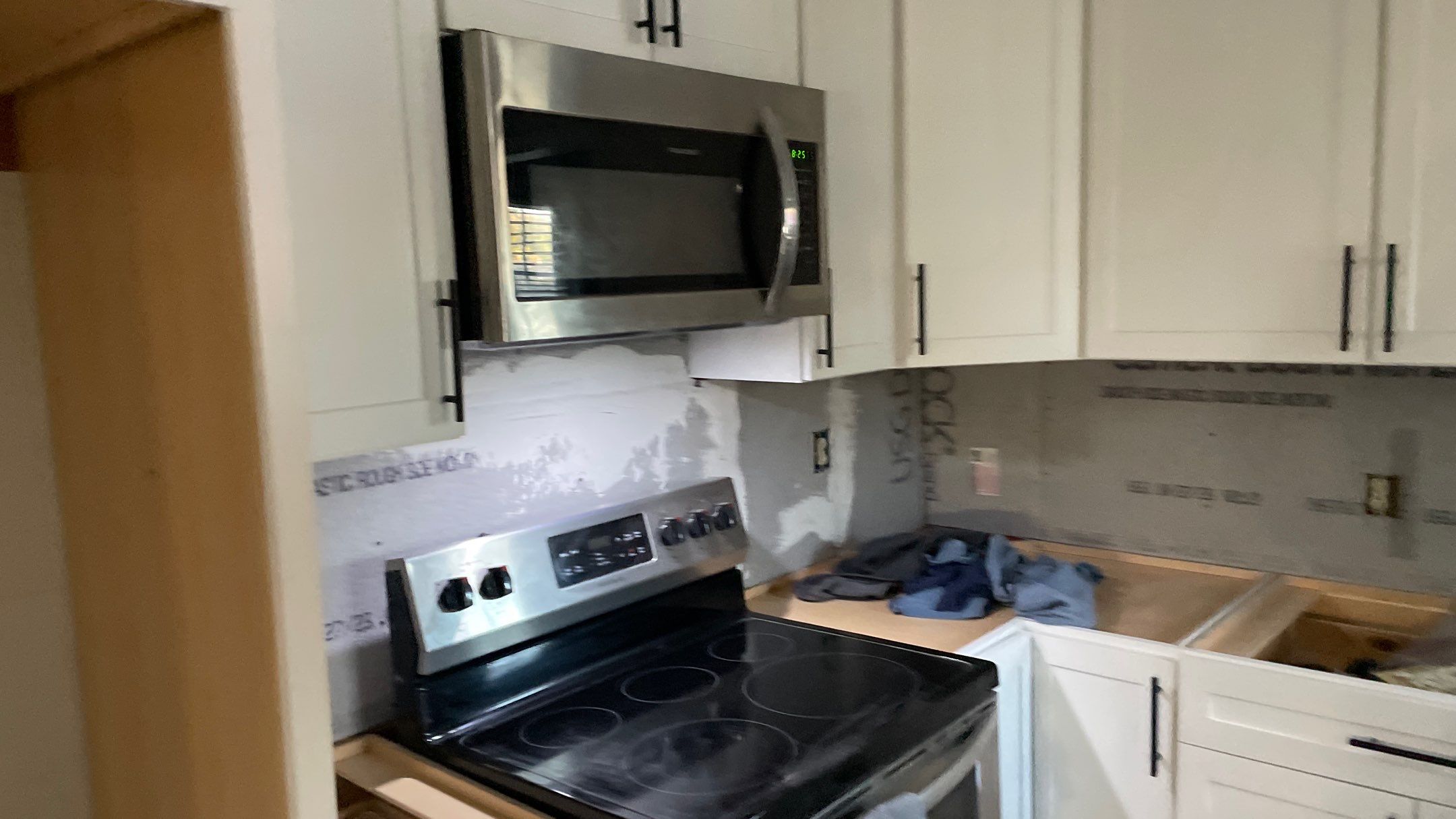 Kitchen Backsplash and Herringbone Tile Floor Remodel by Footprints Floors of Coastal Carolina