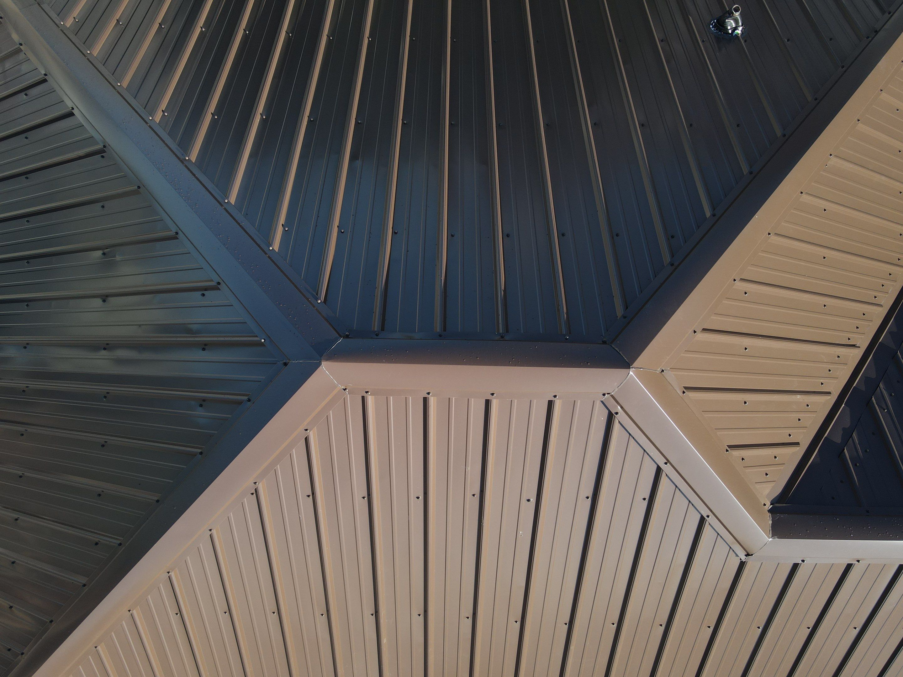 Residential Roofing Installation using Performance Panel Metal - Brown by RoofX