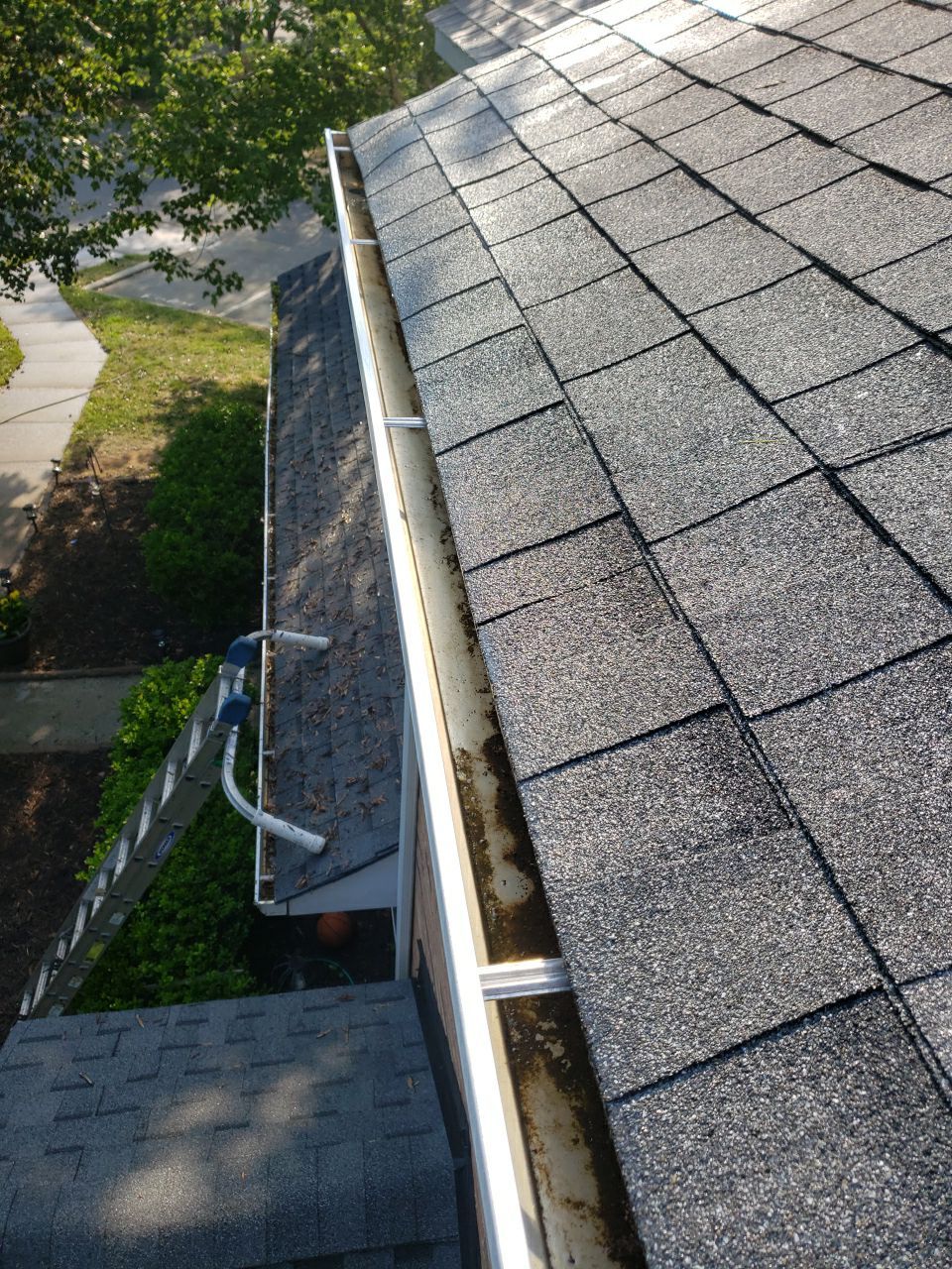 Gutter Cleaning using water by G&H Home Tech Pros LLC