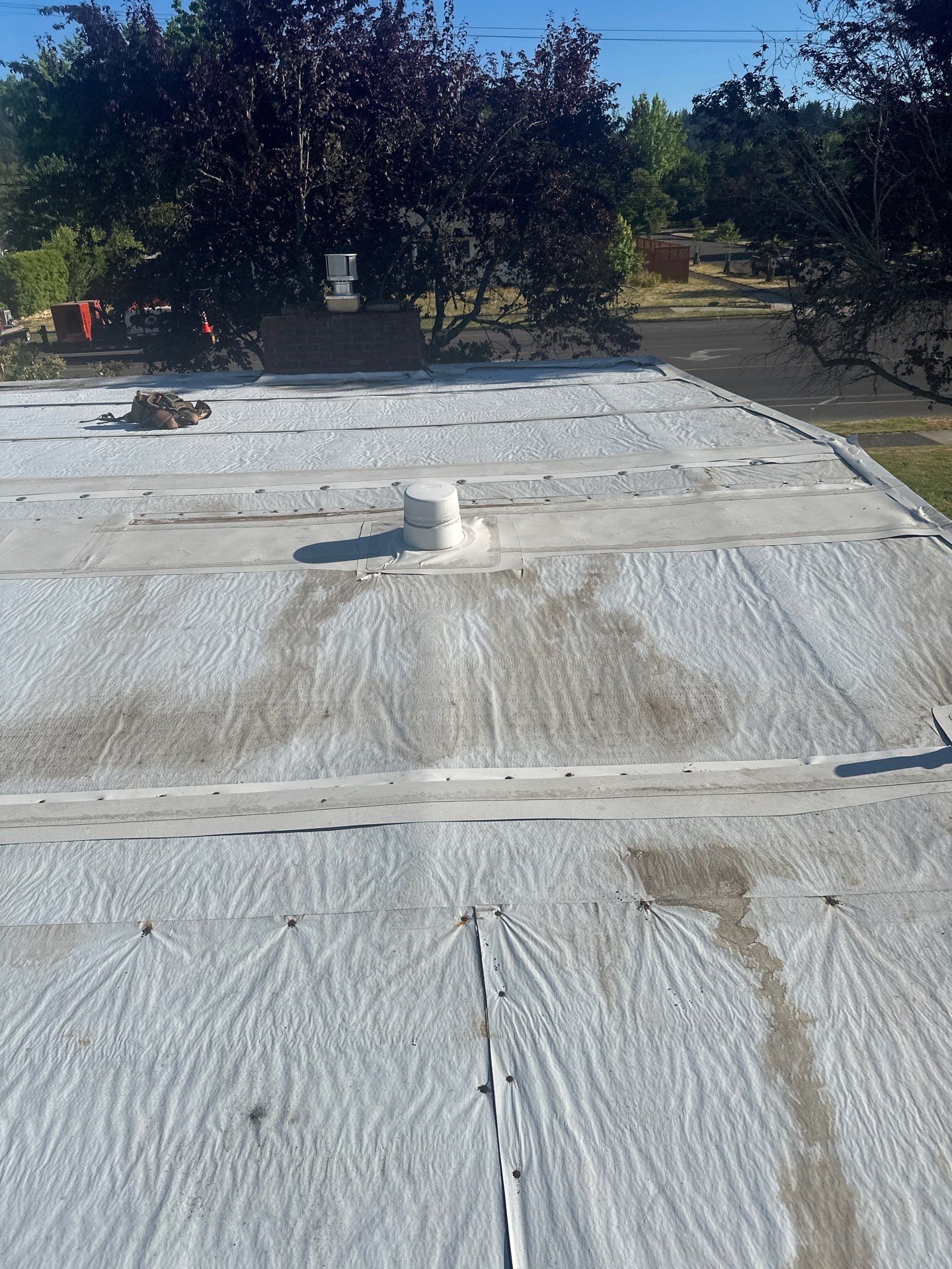 Residential Flat Roof Installation using GAF 60Mil TPO  by Orezona Building & Roofing Company, Inc.