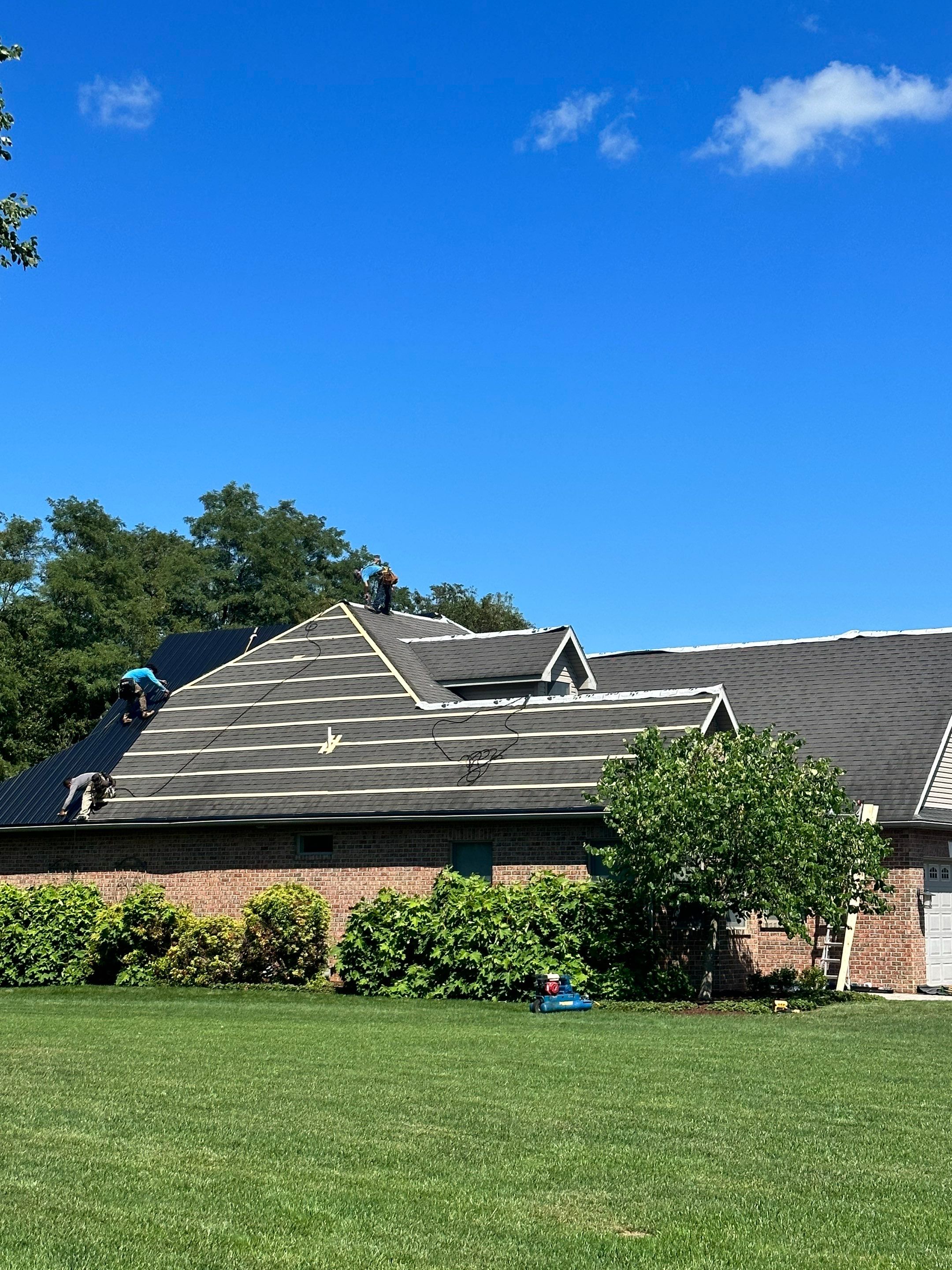 Standing seam / Azm panel in black  by Teflon Roofing