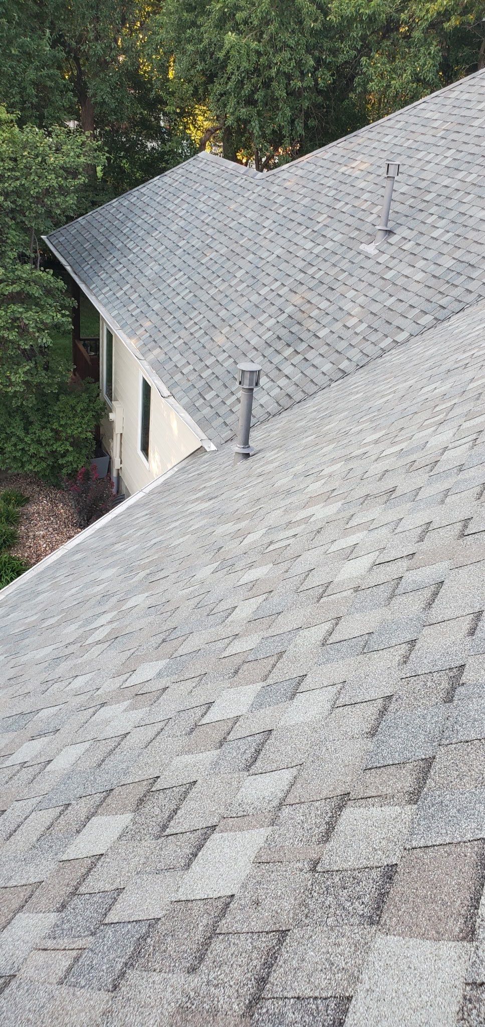 Storm Damaged Roof & Gutter Replacement by Eaton Roofing 