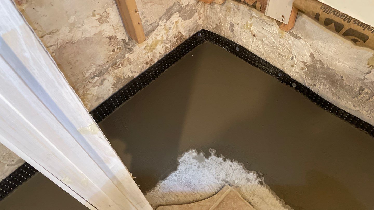 Drain Tile in Minneapolis for Kristen & Taylor by Waterproofing Northeast