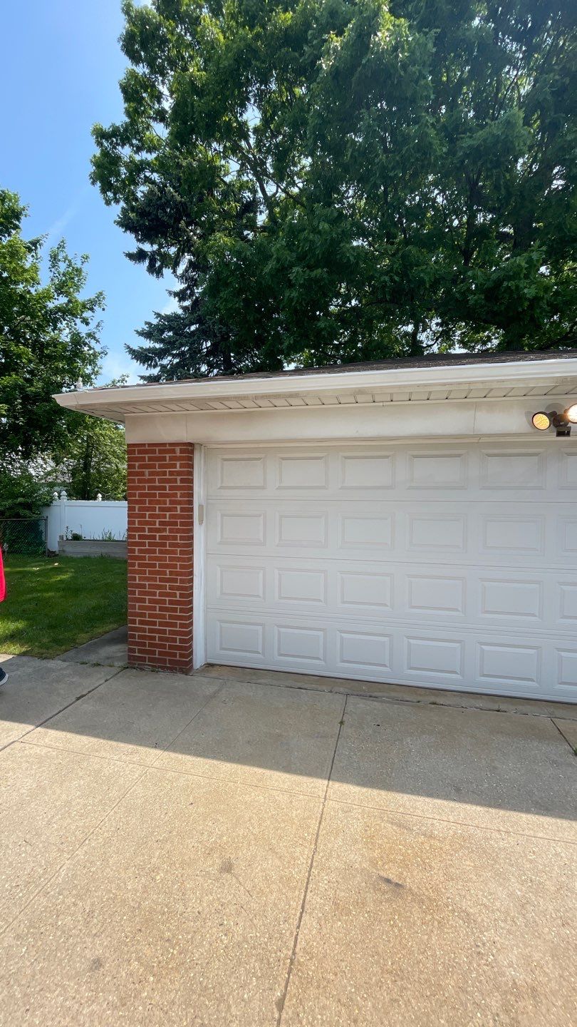 Gutter Installation using 5"white K style seamless gutters and 2x3 white leaders by Above All Gutters 