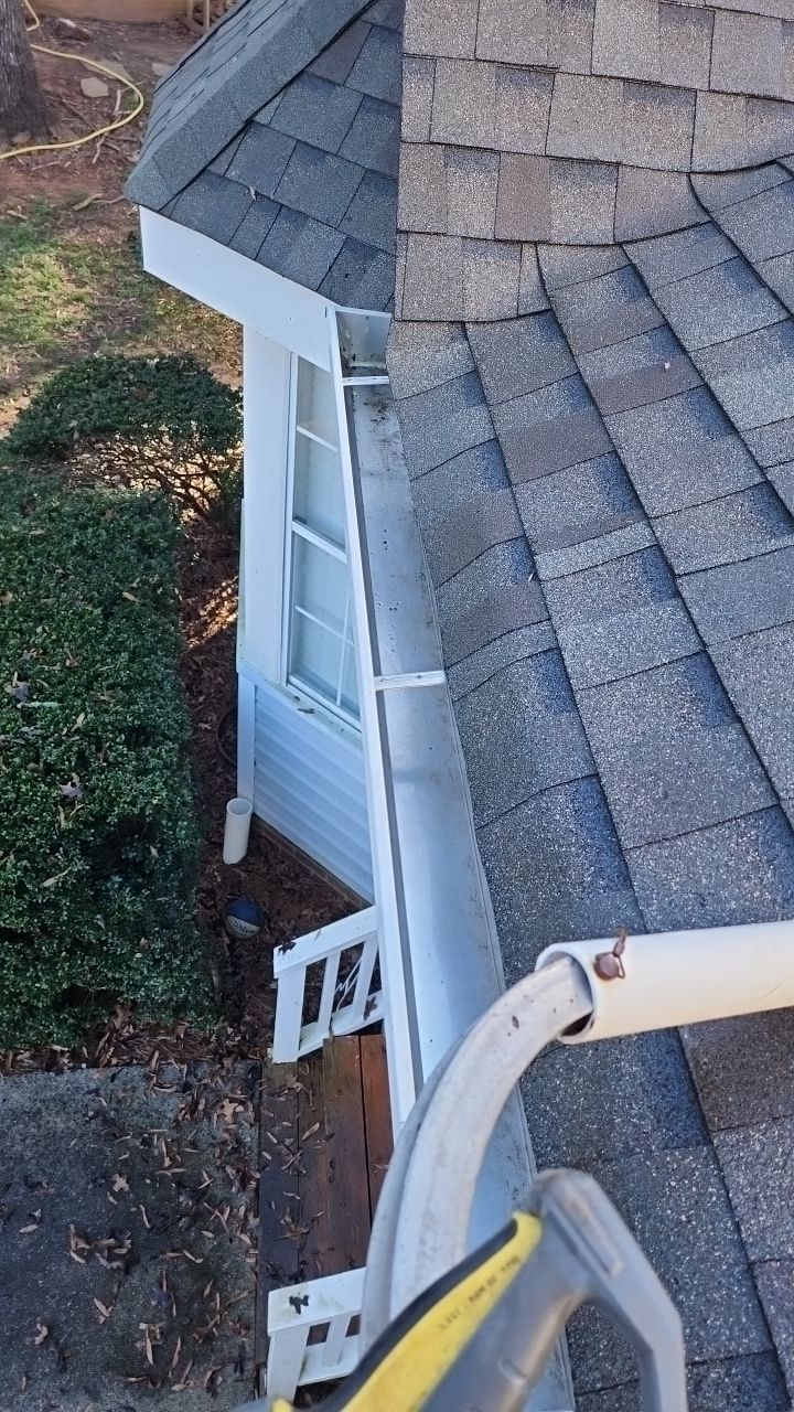 Gutter Cleaning using water by Power Wash Masters LLC