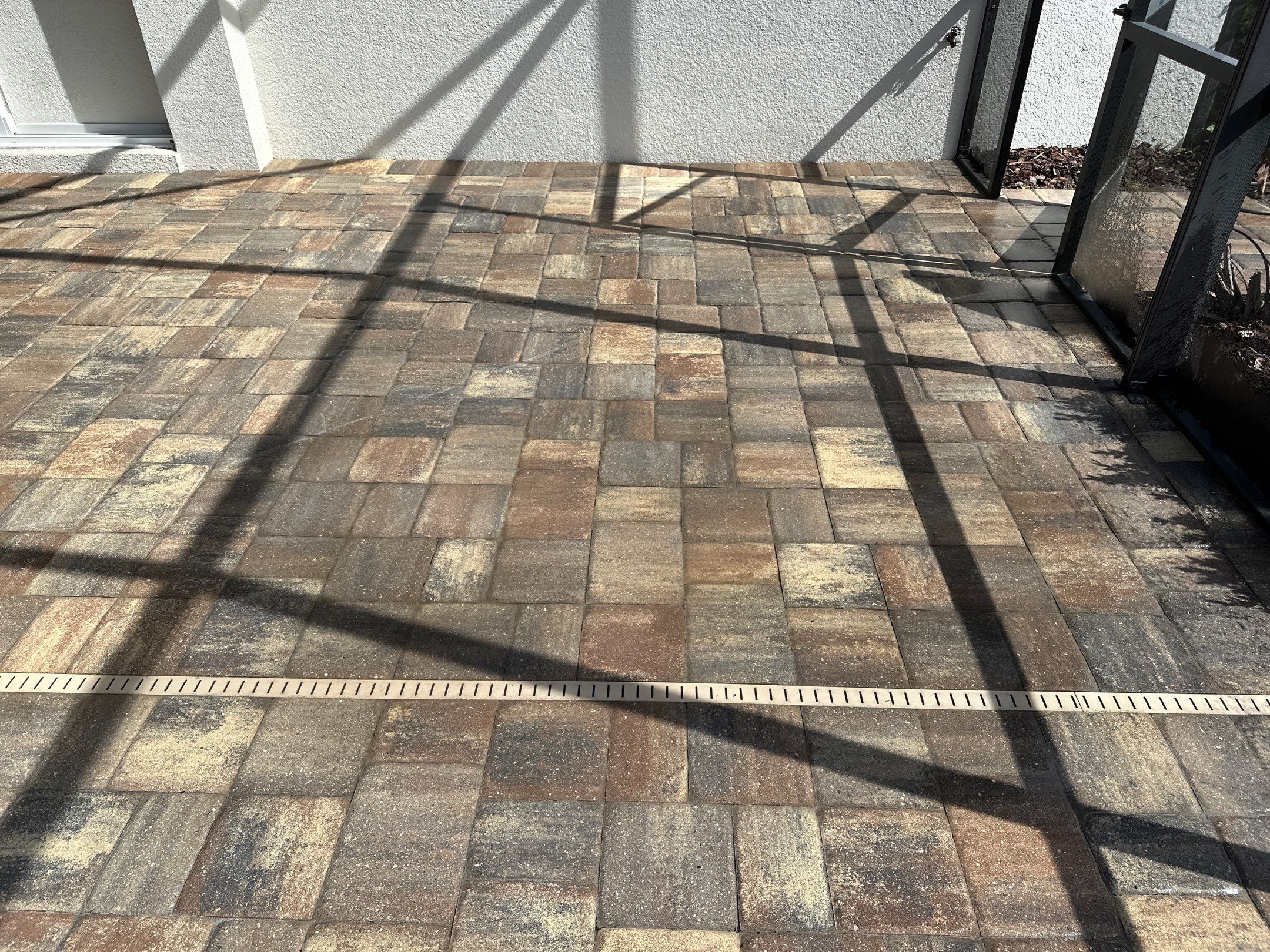 Paver Driveway, Sidewalk, and Pool Deck Cleaning in Winding River Community, Bradenton, FL by Sunshine AquaWash