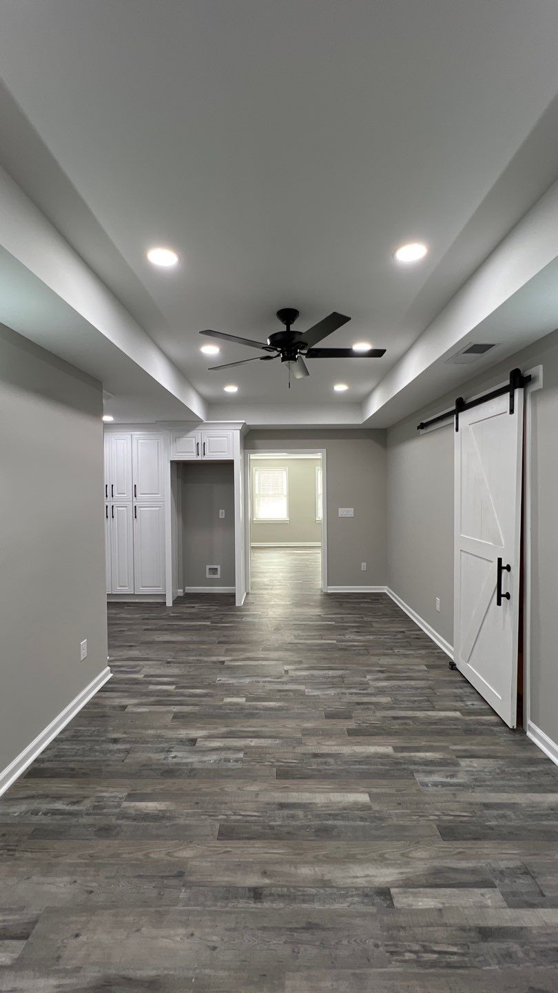 Modern Basement Finishing Project in Acworth Featuring Custom Wet Bar by Swift Home Renovations