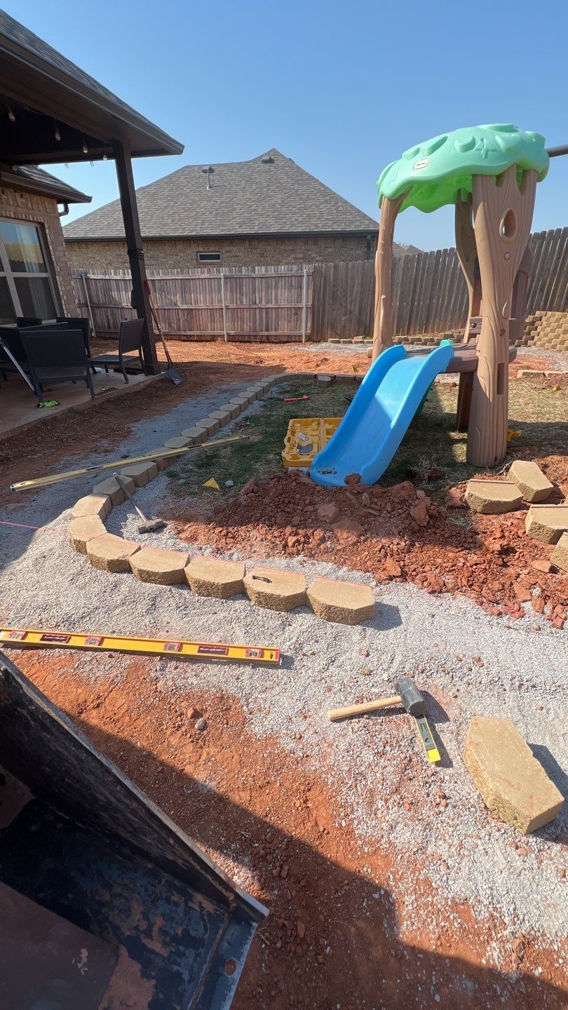Retaining wall / Playground by Clays Services Inc