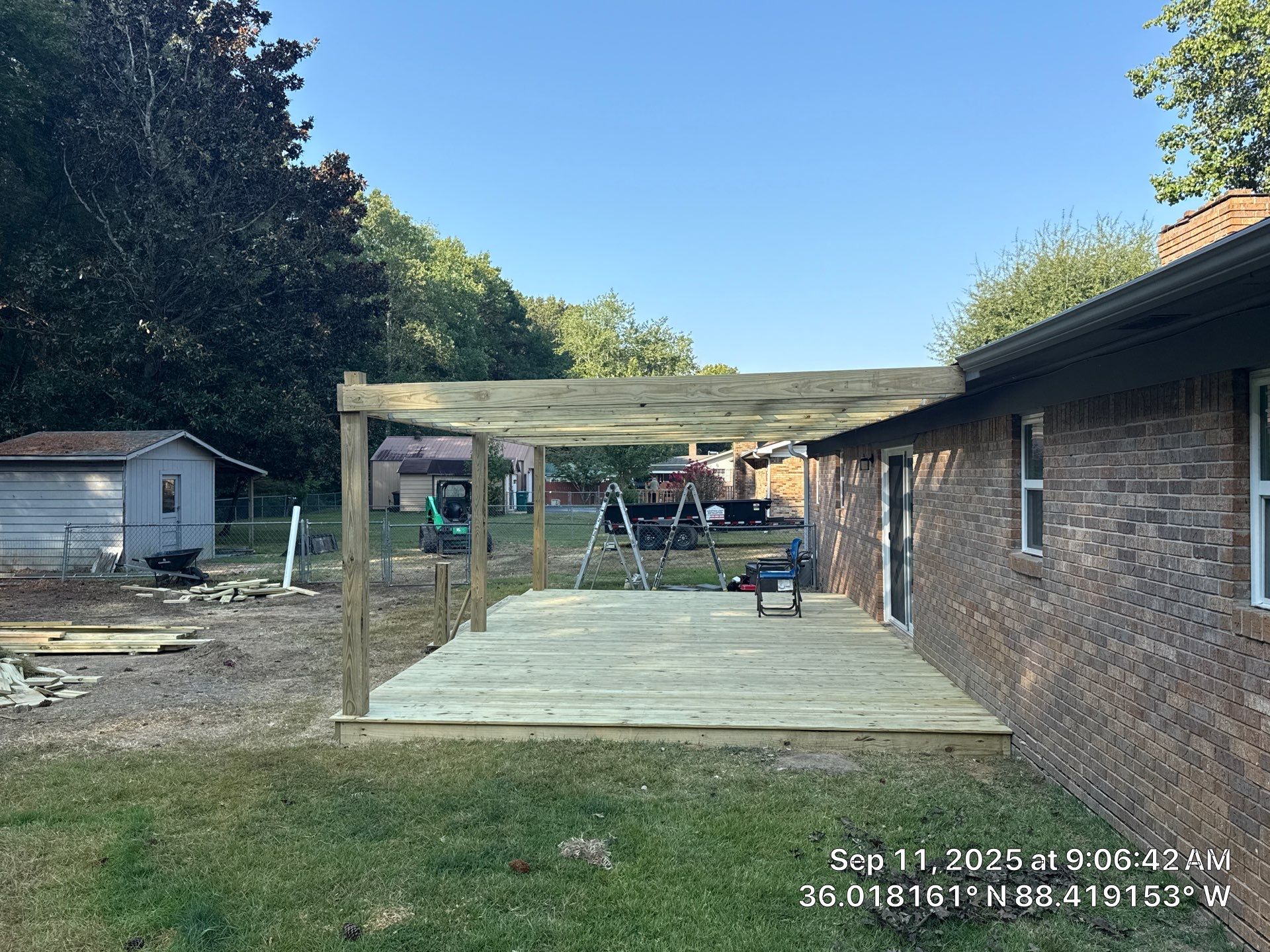 Front Entry Enhancements and a Back Deck Upgrade by Elite Proscapes LLC