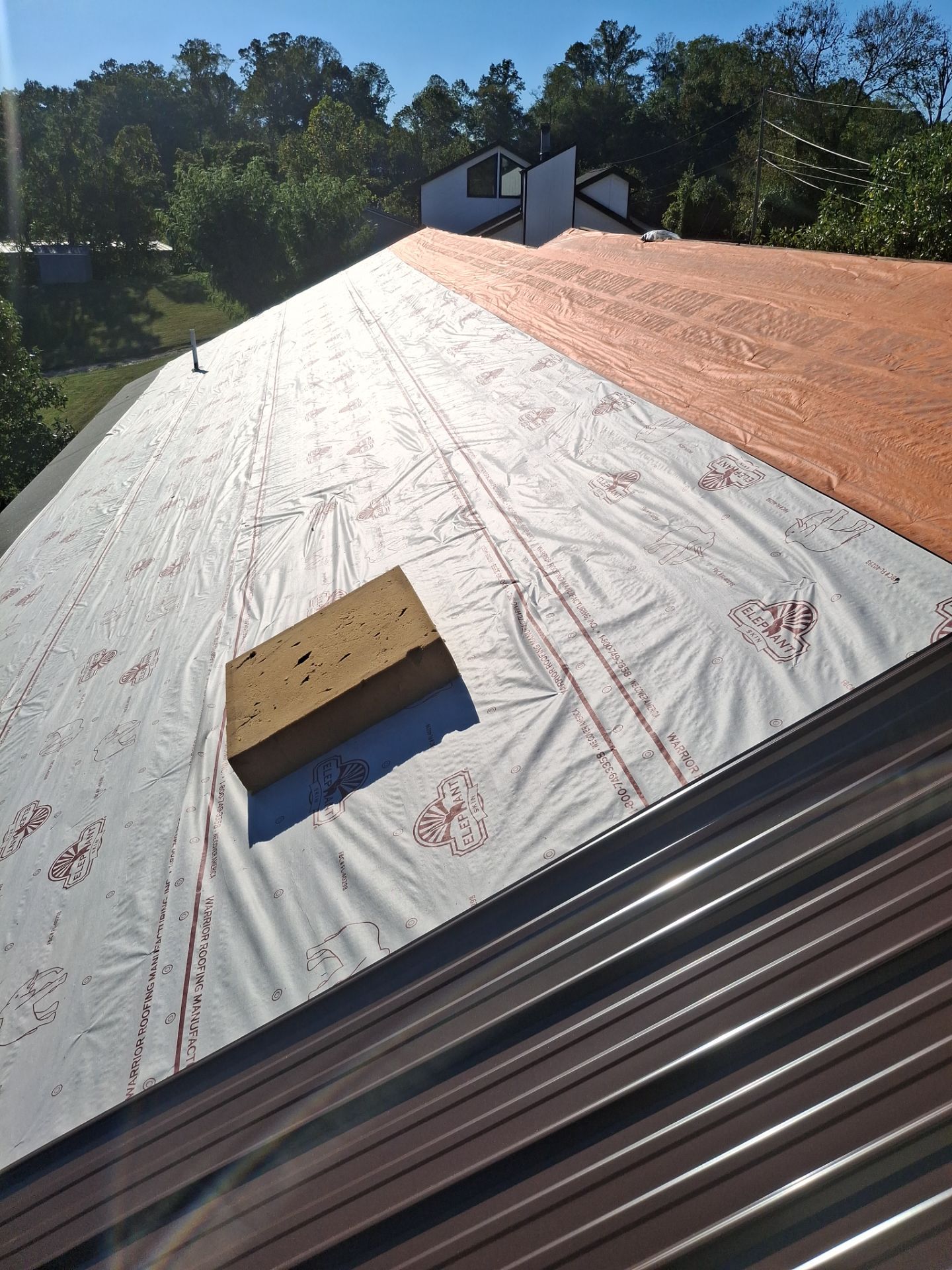 Residential Roofing Installation using Metal by Rainstoppers Roofing
