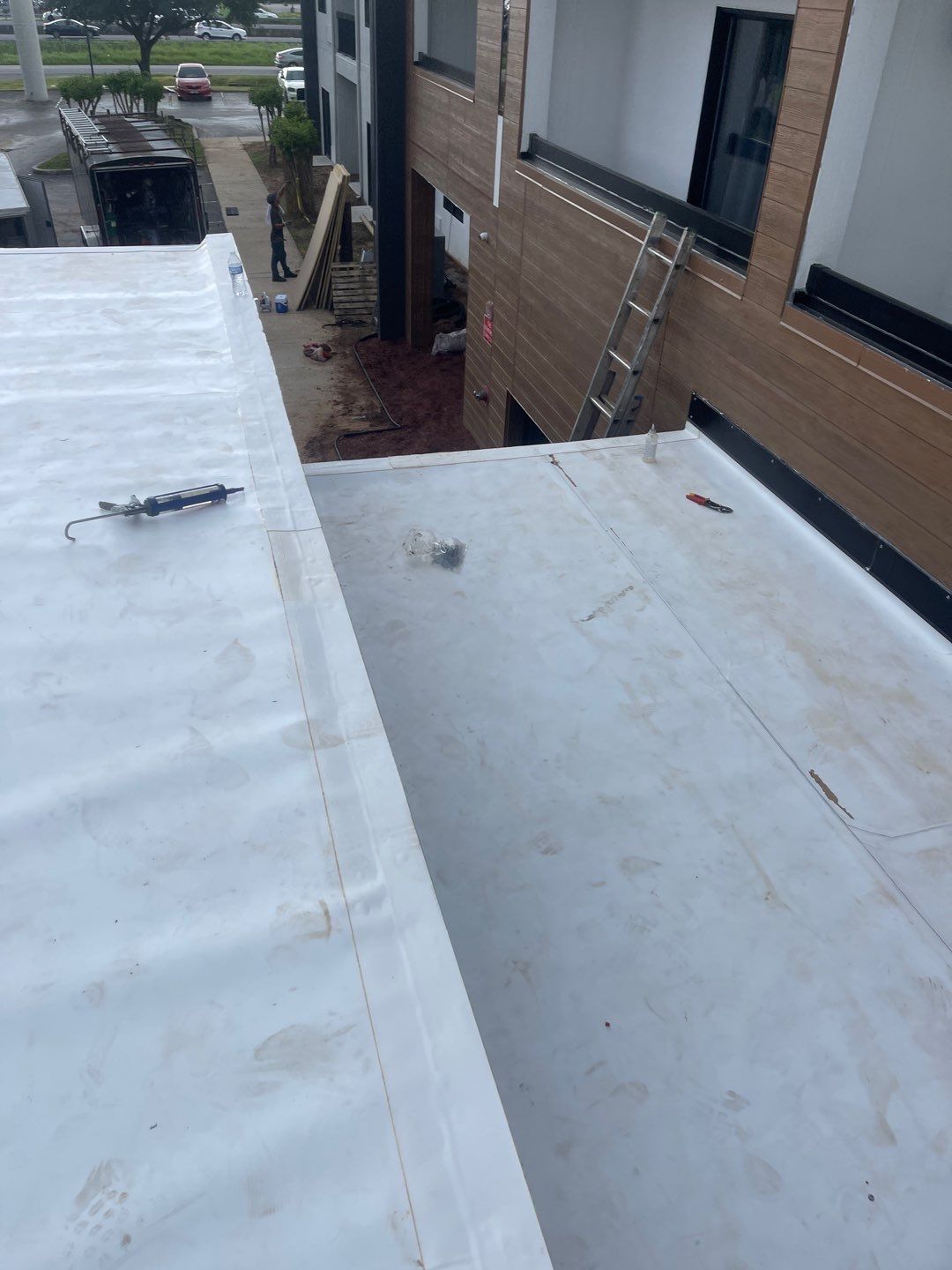 Commercial Roofing Installation using Roof Replacement by American Roofing & Construction LLC