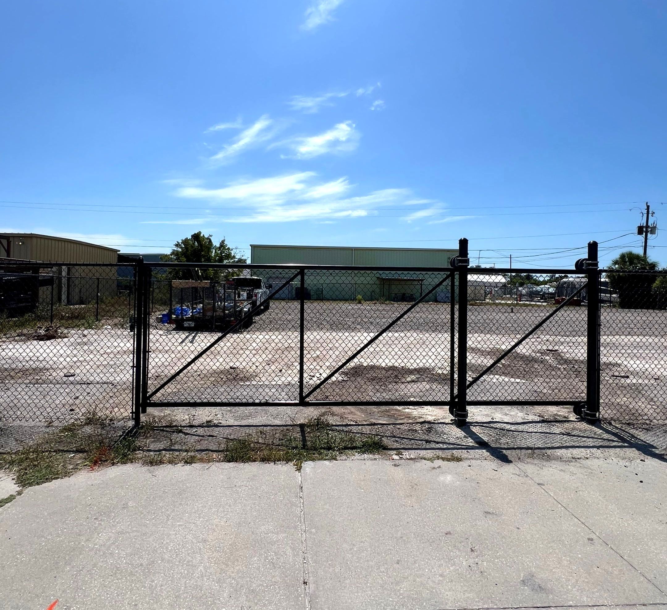 Chain-link Fence Installation using 6ft Black Chain Link Fence  by Asap fence and gates, LLC