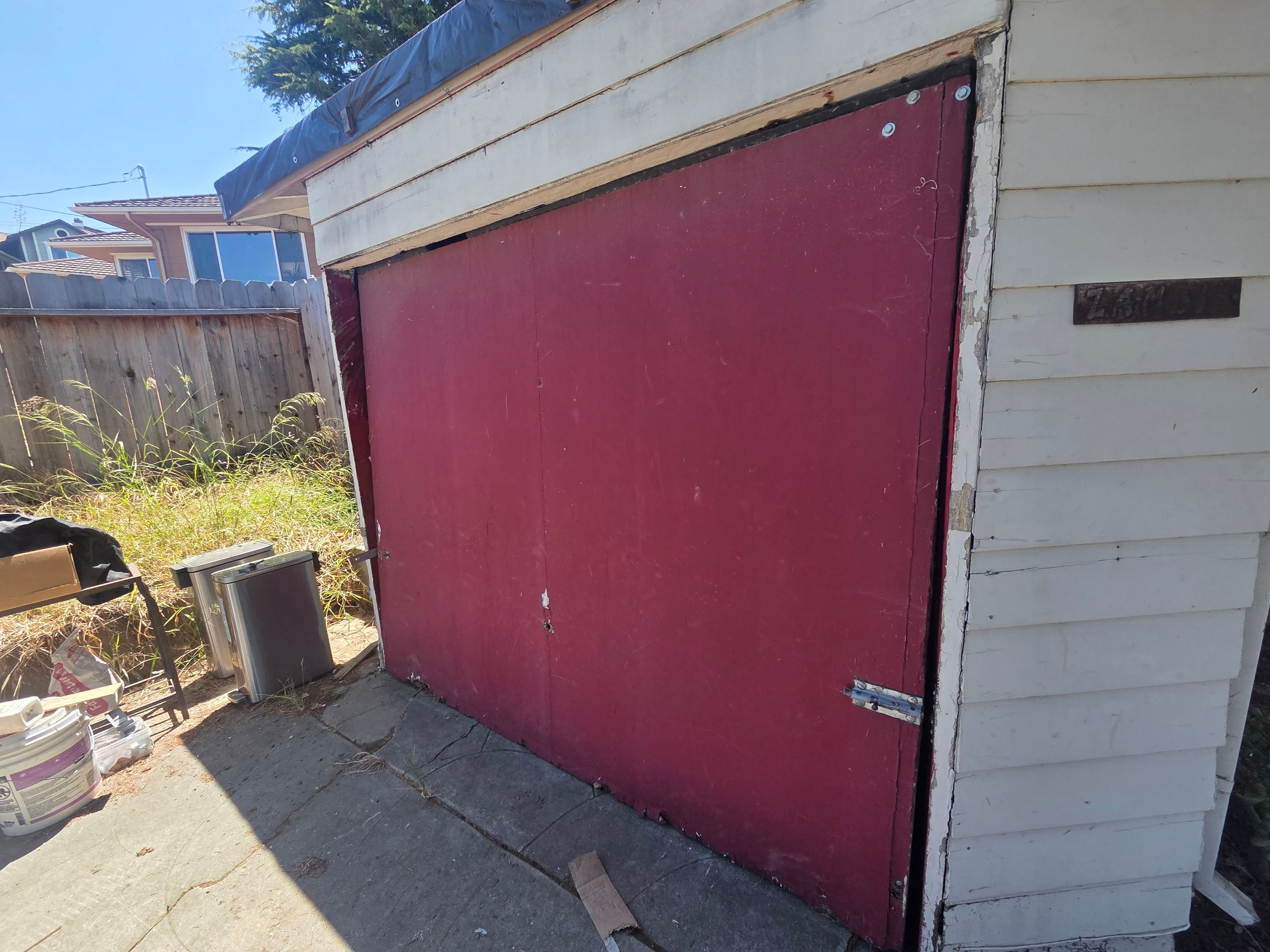Detached Garage Complete Panel Replacement and Structural Header Repair in Hayward CA by Valiant Garage Door