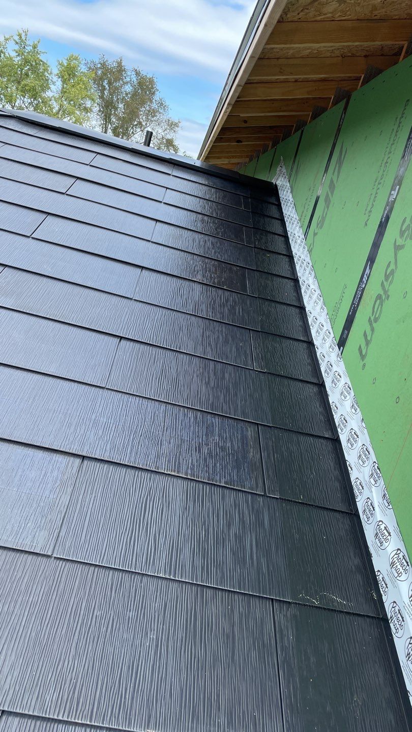 Tesla Solar Roof  using Tesla Solar Roof V3 tiles by American Home Contractors