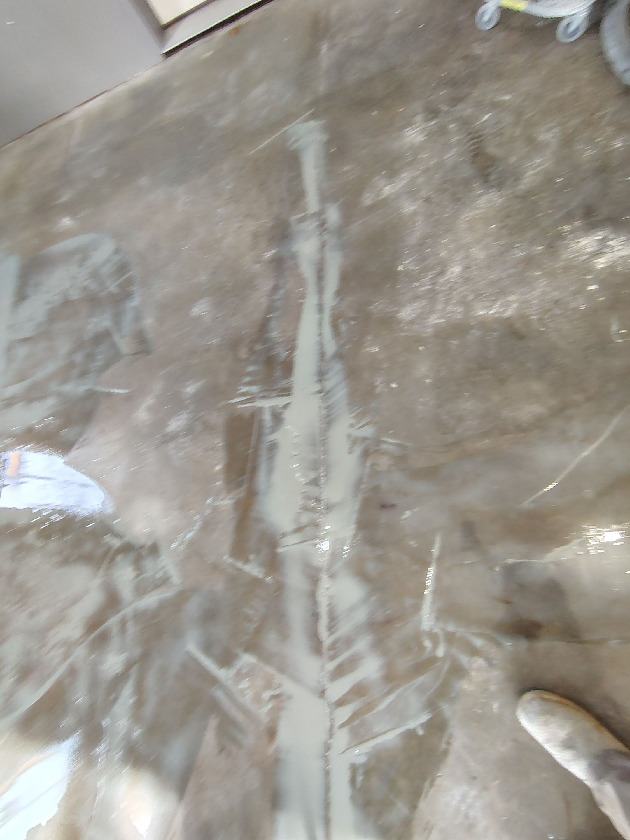 Garage Floor Concrete Coating and Crack Repair in Sioux Falls by Select Painting, Coatings & Garage Cabinets