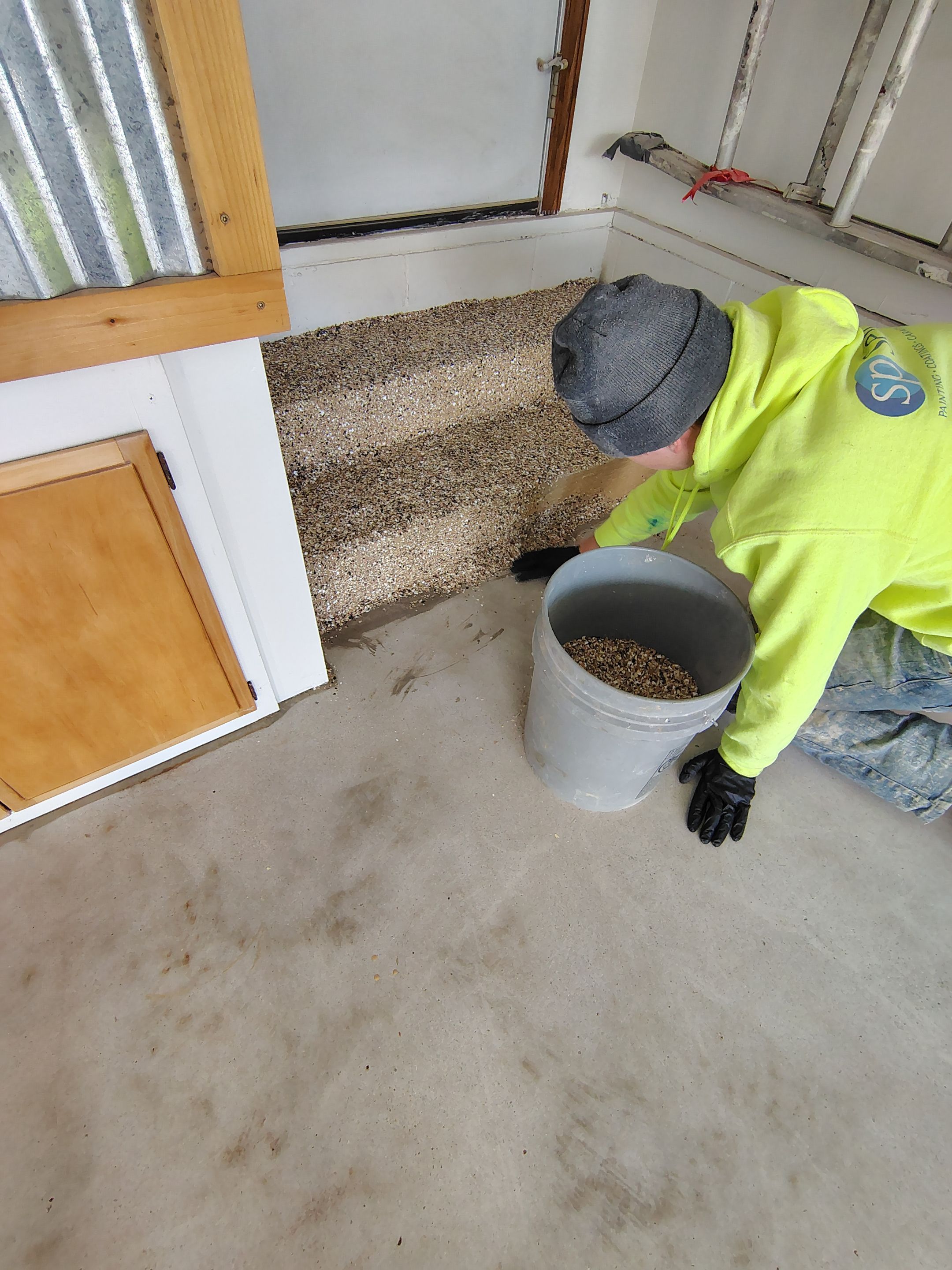 Multi-Colored Flake Epoxy Garage Floor Coating and Crack Repair by Select Painting, Coatings & Garage Cabinets