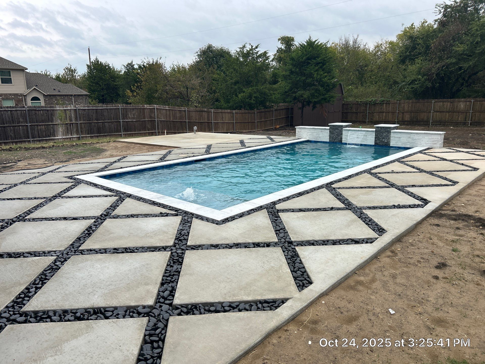 Modern Geometric Pool with Raised Wall and Paver Deck by Pinnacle Pools and Spas - DFW