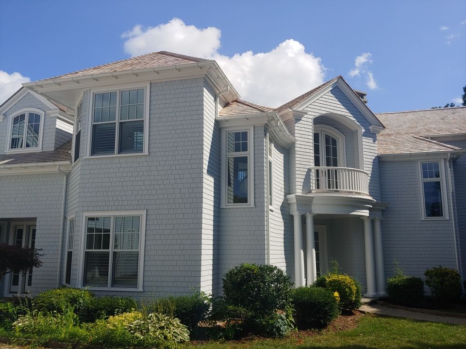 Gutter Installation using 6" Half Round Aluminum Gutter over Crown Moulding by Gutter Pro Enterprises