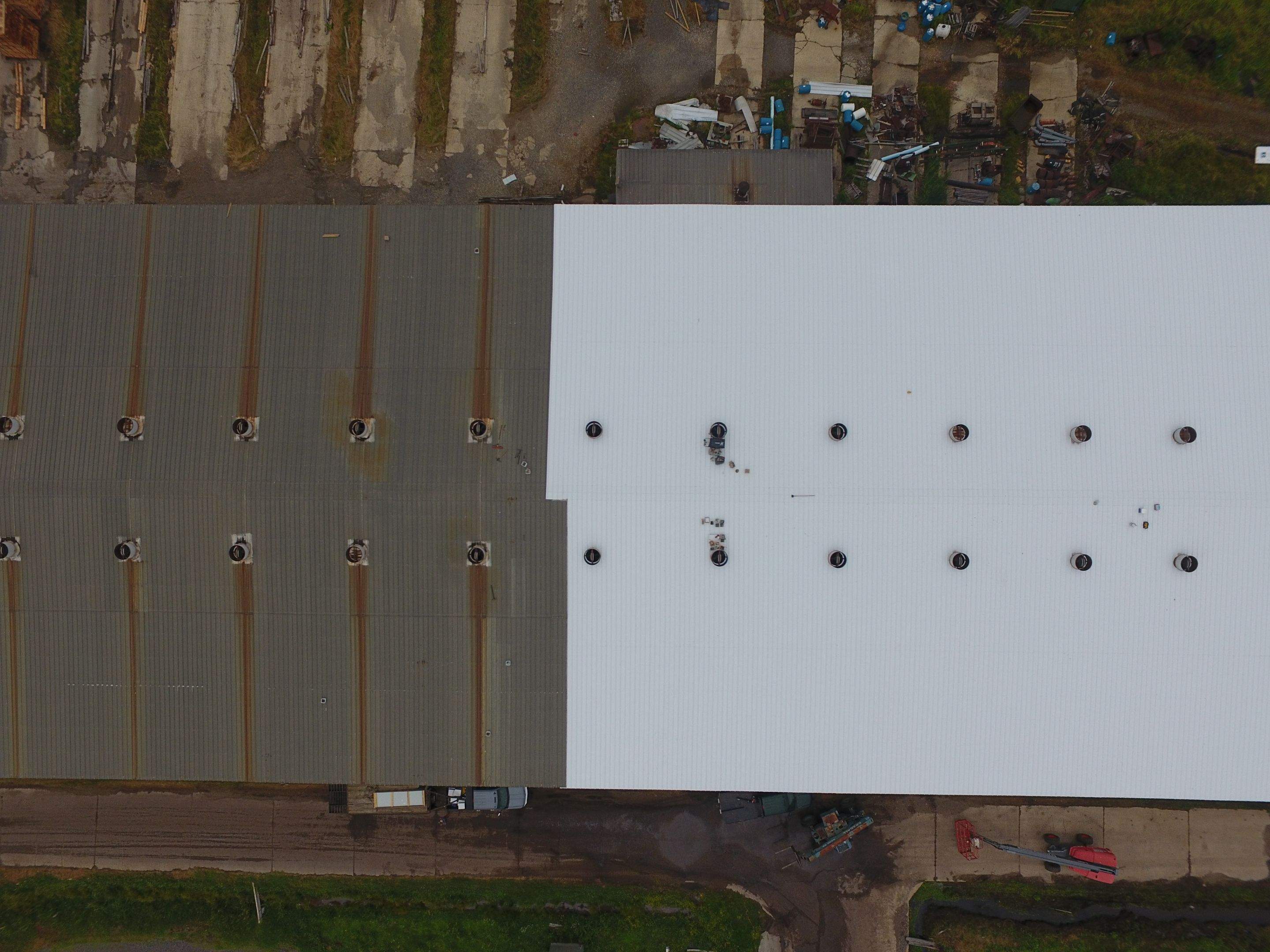 Commercial Roofing Installation using Aluminum Roofing panels by Hostetler Roofing