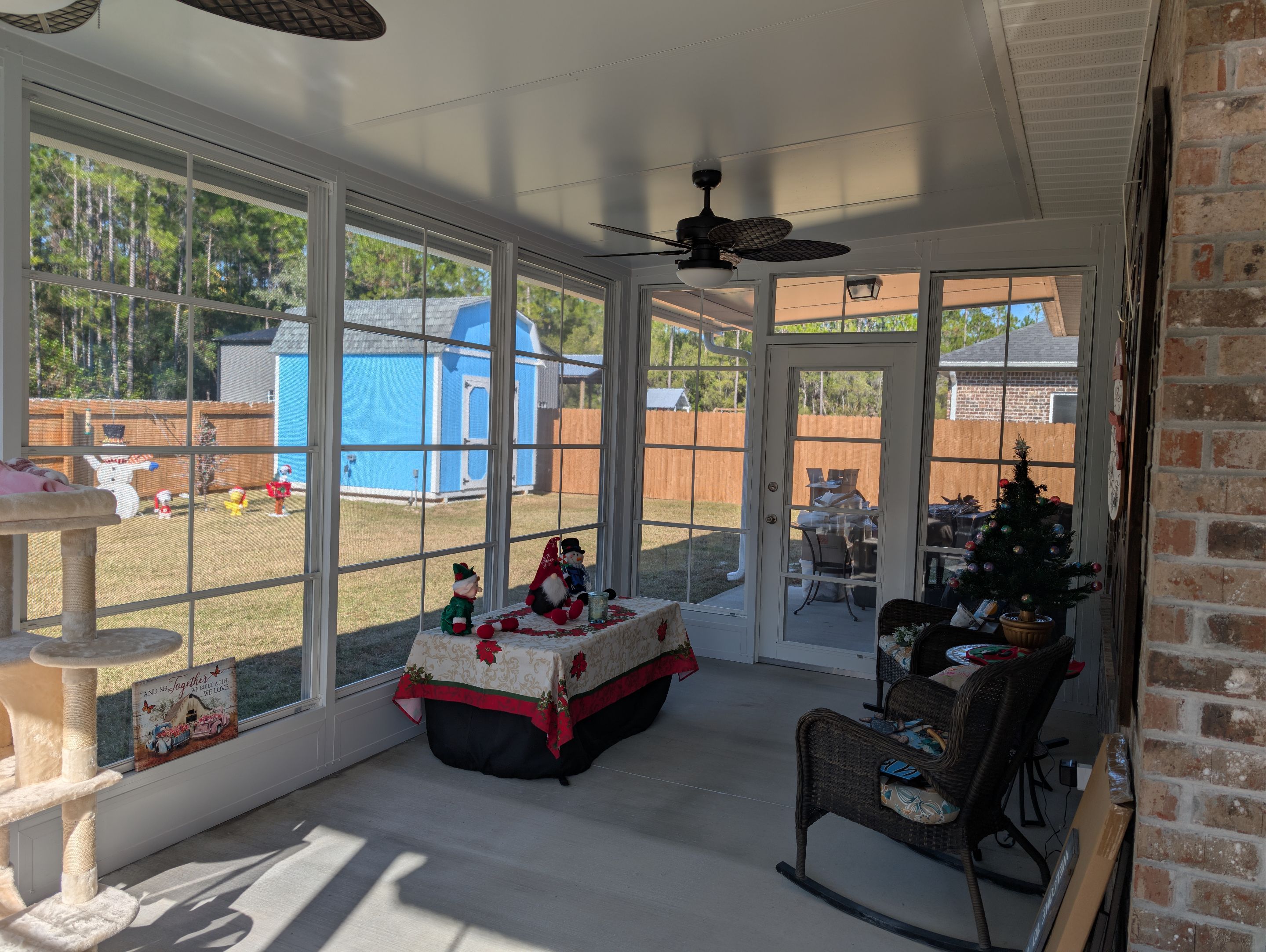 Home addition w/Vinyl 4-Track Windows by Titan Sunrooms