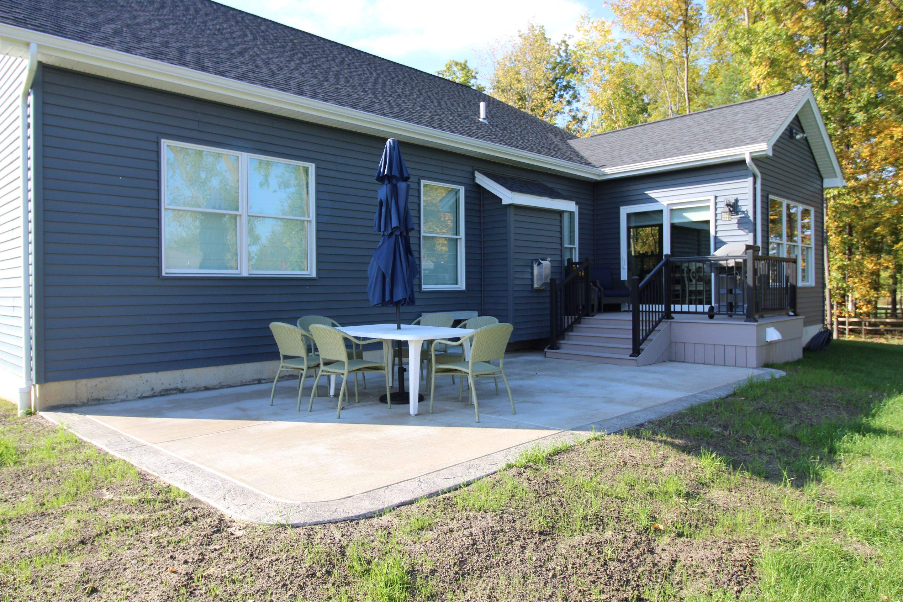 Outdoor Living- Deck and Concrete by Ivy Lea Construction
