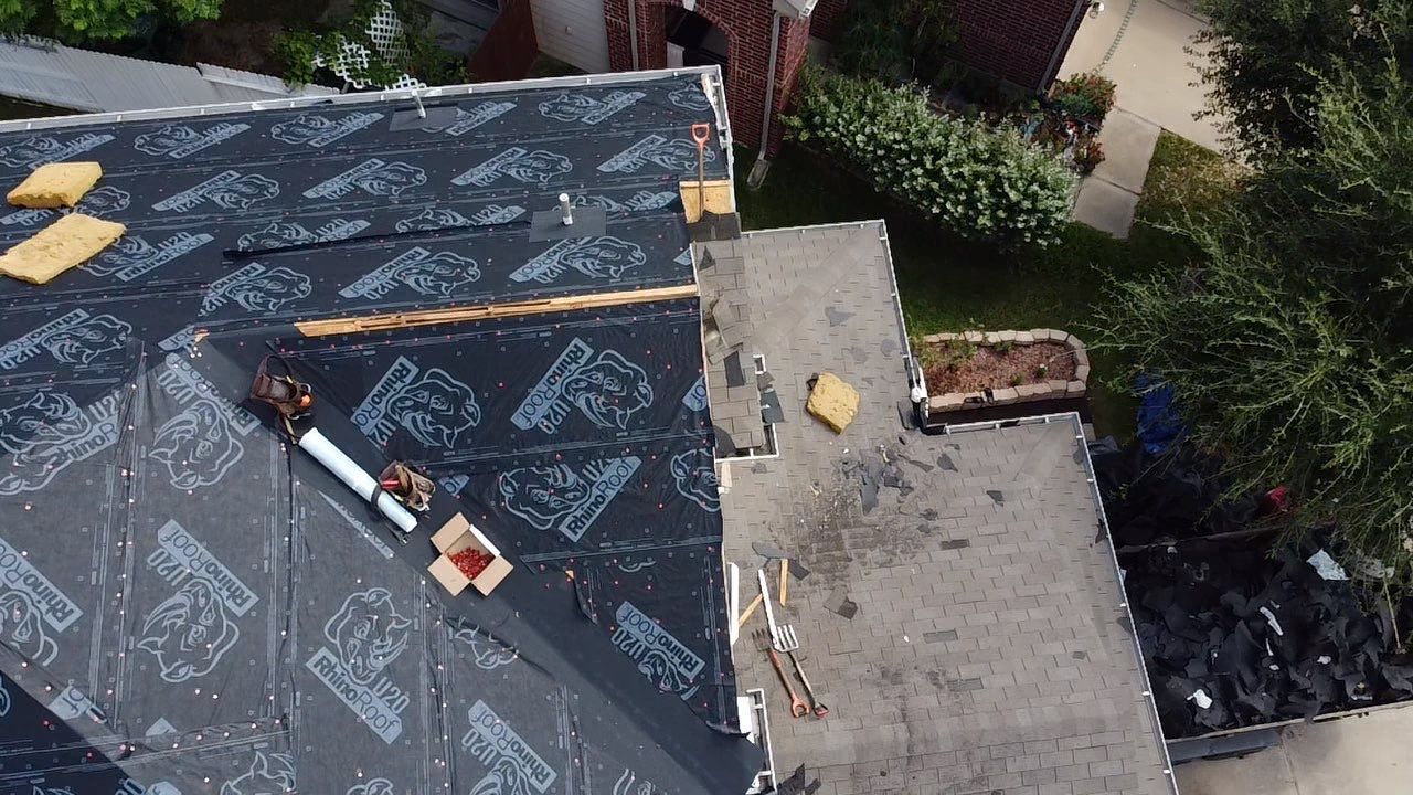 Owens Corning Shingle Roofing Replacement for Houston Two-Story Home by Houston Roofing & Construction