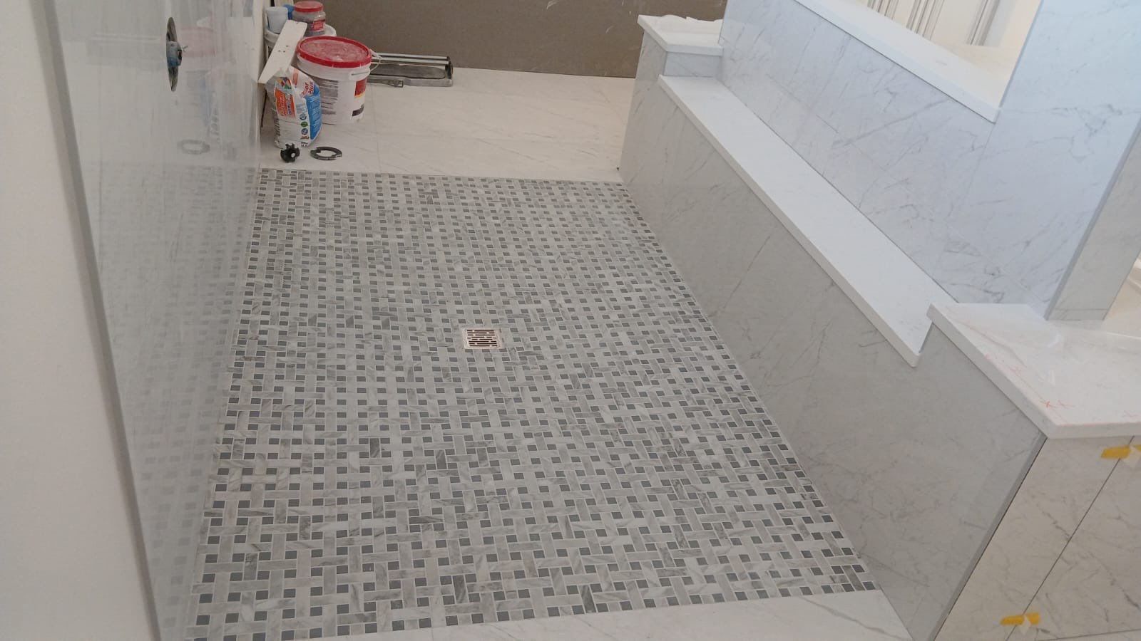 Kitchen and Bathroom Remodel Featuring Custom Stone and Tile in Mico by Mena stone surfaces