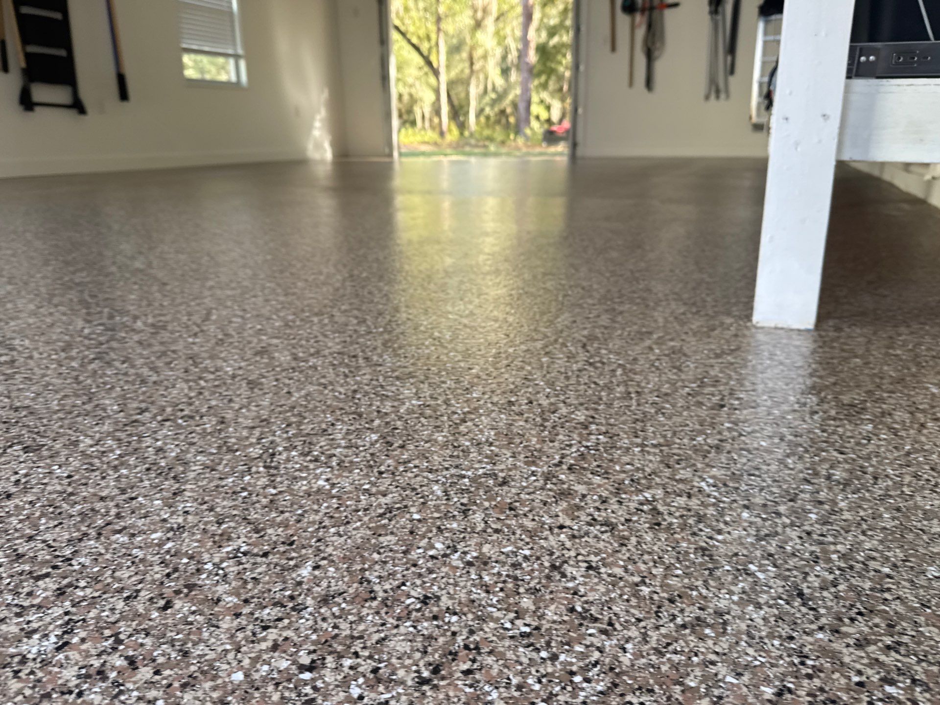 Garage in Hawthorne, FL in Sandstone by Cross Creek Concrete Coatings