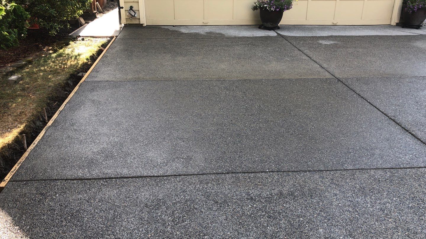 Joan | Concrete Driveway & Walkway   by Jireh Asphalt & Concrete Inc 