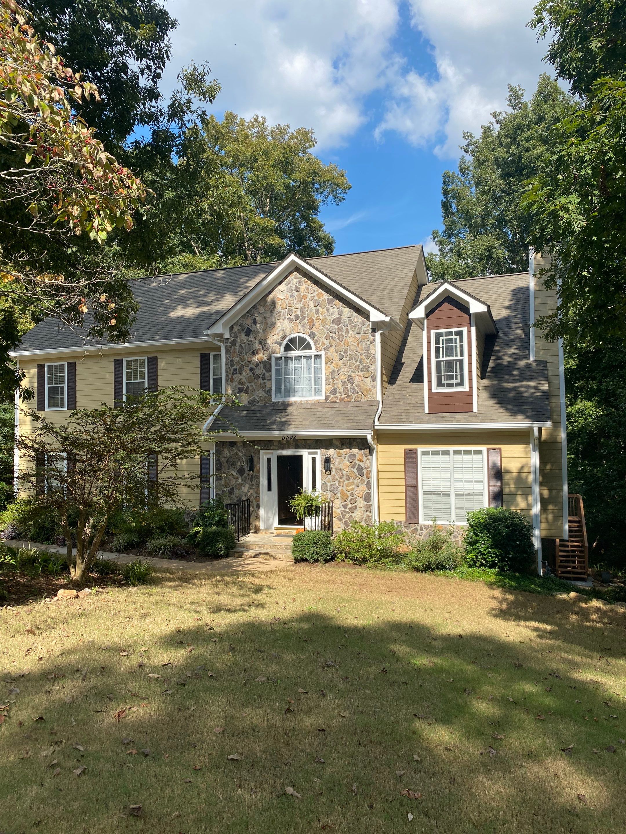 Full Exterior House Painting for Suburban Residence in Douglasville by Swift Home Renovations